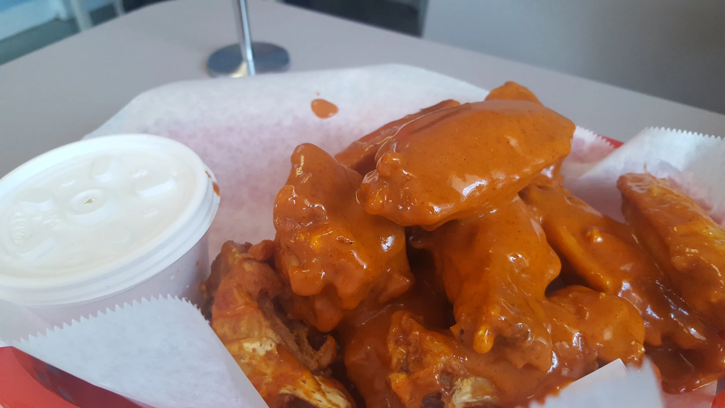 Buffalo Wings with Ranch Sauce.