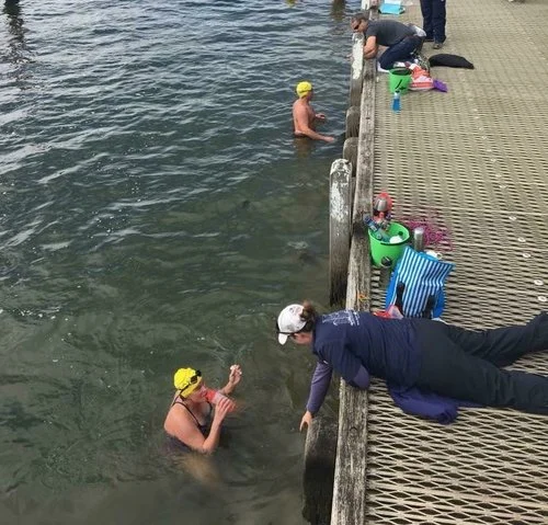 Nicky assisting swimmers and those learning to crew for them at VladSwim Cold Water Swim Camp Melbourne 2017