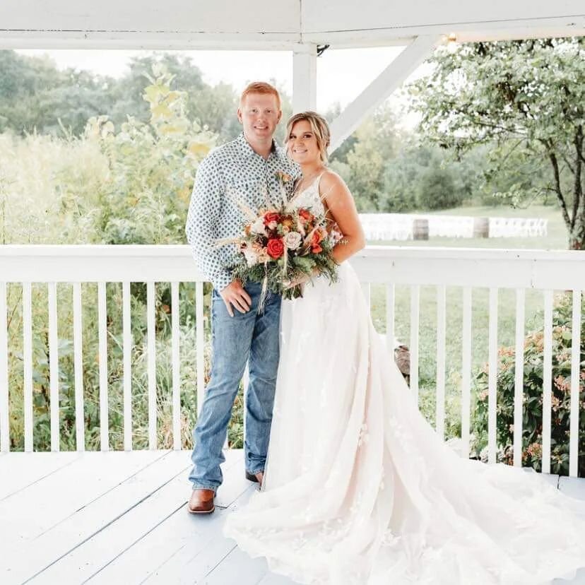 The rain cleared up long enough to get the chairs dried and arbor moved out for the beautiful wedding of this sweet couple. Even despite the rain, gorgeous photo opportunities are abundant at the farm. The covered gazebo is only one of the locations 