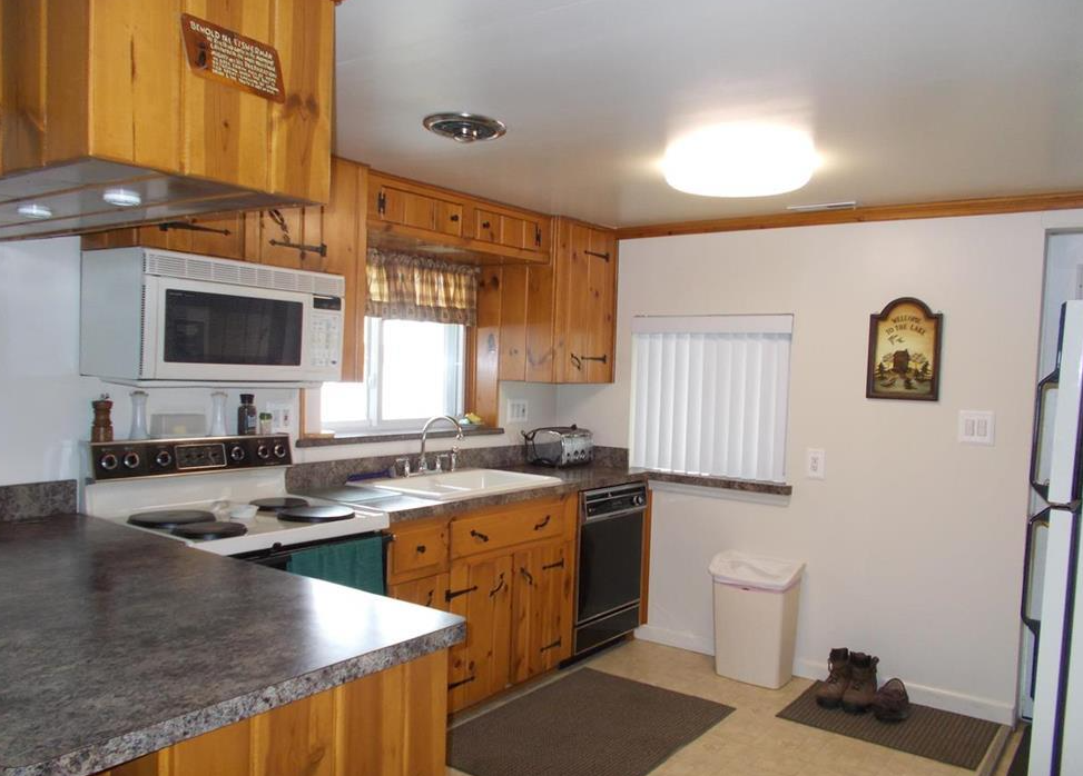 Carole Wilson Real Estate 8791 Saint Aubin Dr. West Londo Lake