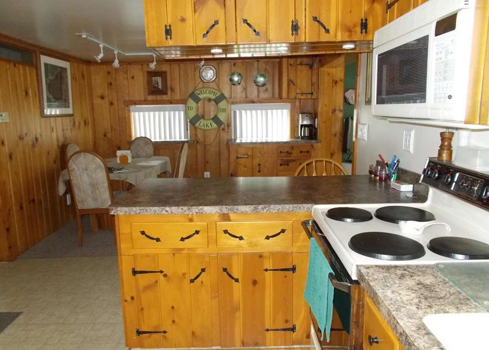 Carole Wilson Real Estate 8791 Saint Aubin Dr. West Londo Lake