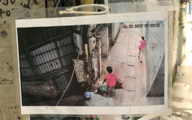 Những bức hình người đổ rác trộm được trích xuất từ camera, có ngày giờ rõ ràng, nên không ai phản đối hoặc đến đòi gỡ xuống. Ảnh: Lệnh Thắng.