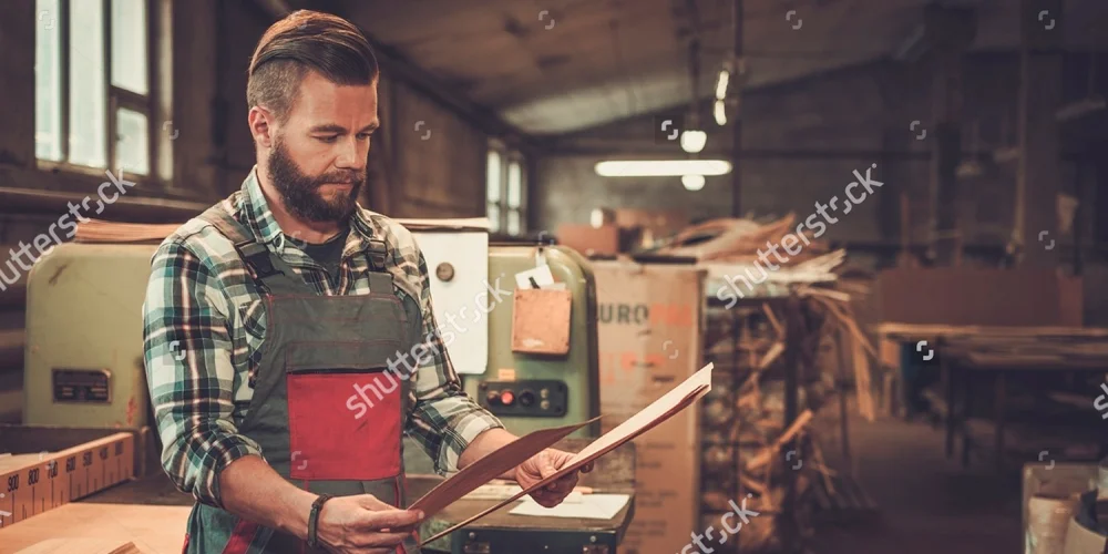 stock-photo-carpenter-doing-his-job-in-carpentry-workshop-432133186-WEB.jpg