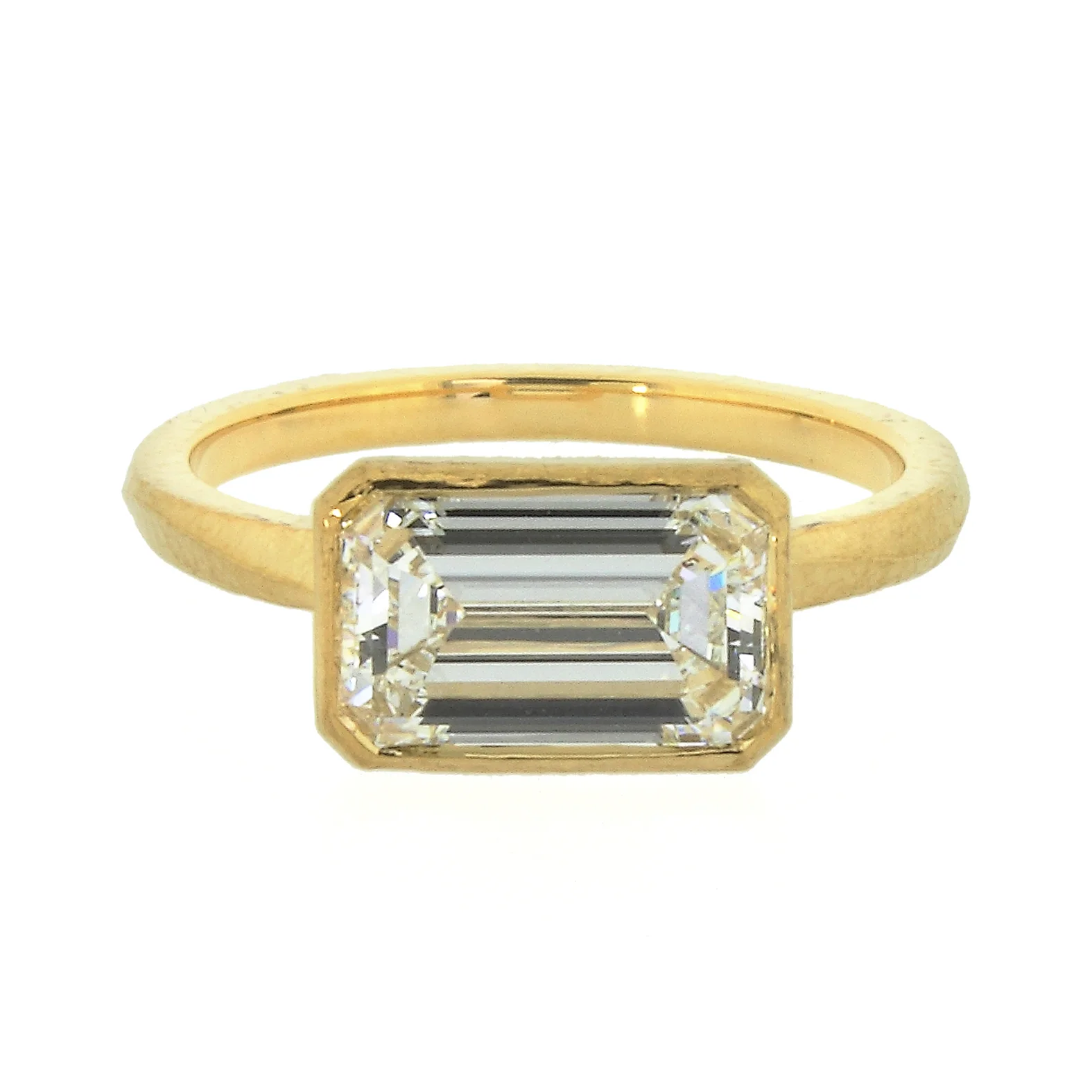Emeral Cut Diamond Wave Horizontal Bezel Solitaire Ring