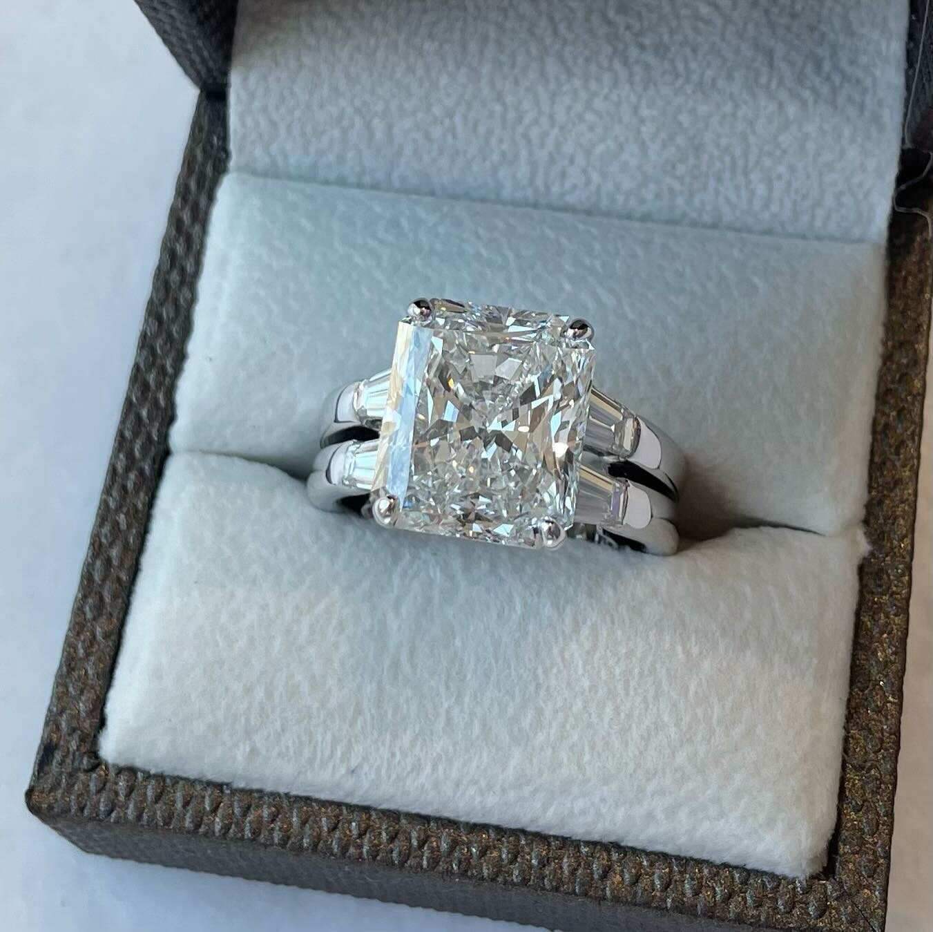 The pictures say it all!

8 1/2 Carat, GIA certified, natural earth mined radiant cut Diamond.

We source, design, and create - all in our Wayzata workshop and gallery.  Swipe to see behind the scenes, preparing to set this special diamond.