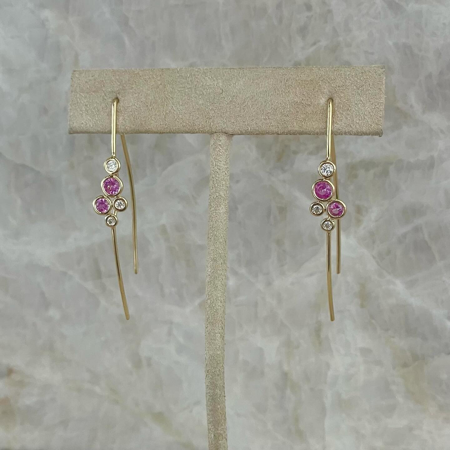 Cheers with ros&eacute; bubbles! 🥂 Pink sapphire and diamond earrings in 18k yellow gold.