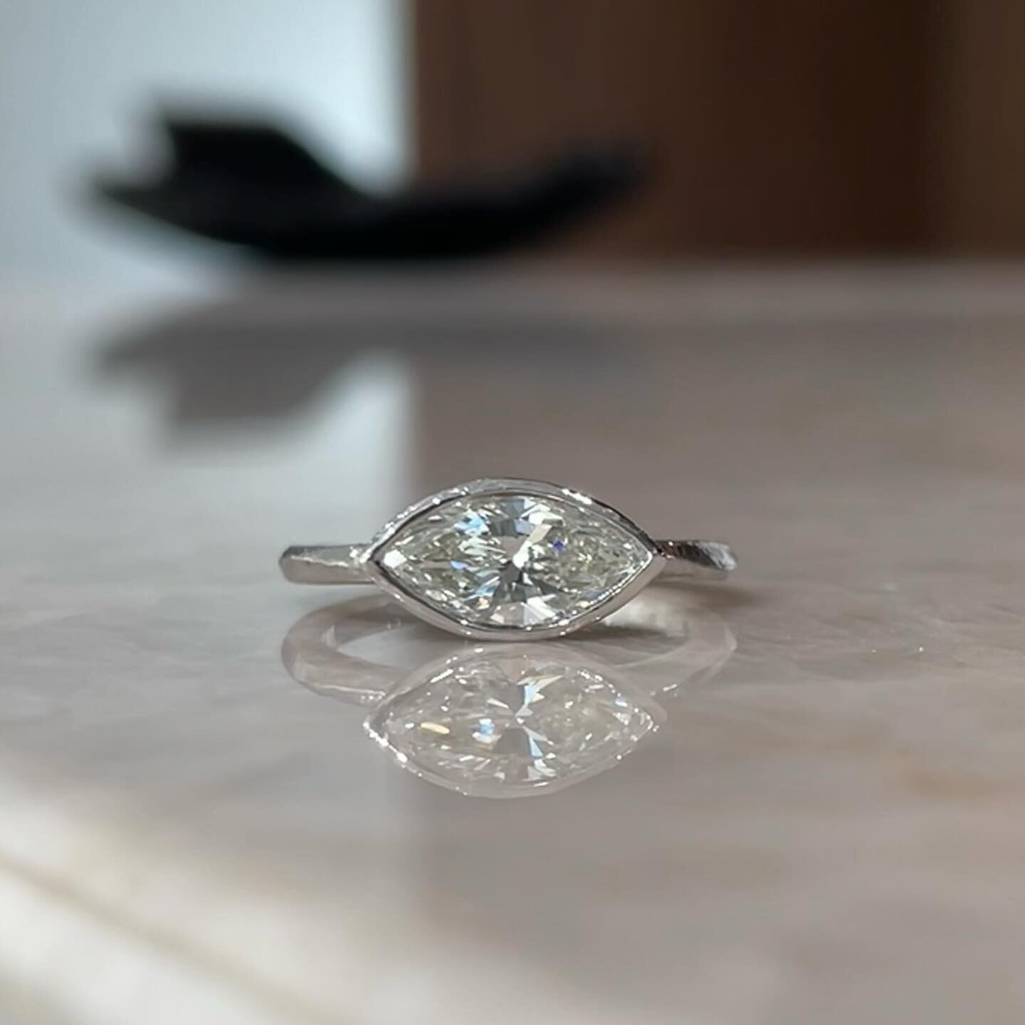 Loving this custom ring! A modern twist for a solitaire diamond ring.

Wave Bezel Solitaire Ring in Platinum with a Treasured Finish, and set with a 1.08ct Marquise Shaped Diamond.