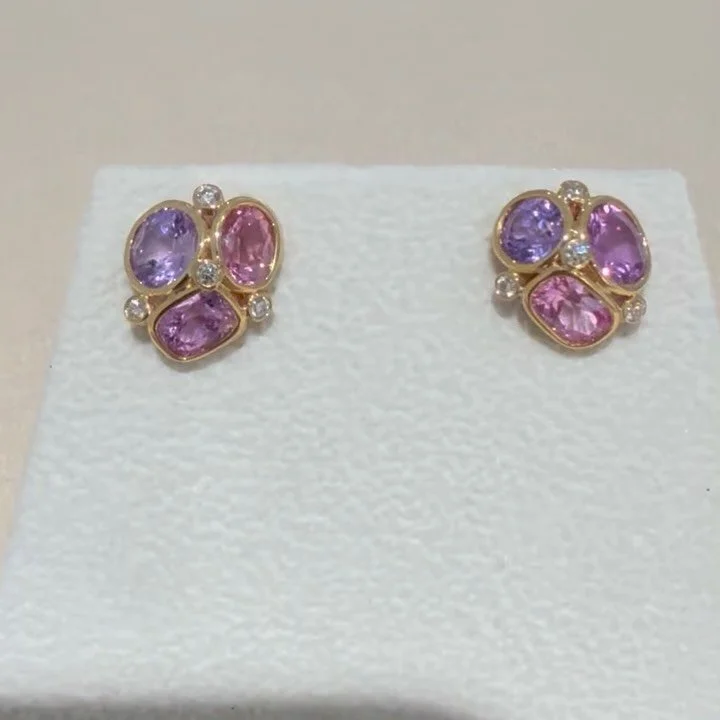 Spring colors! 
Our Bouquet Earring Design set with
varying shades of pink to purple sapphires accented by diamonds all in 18k yellow gold.
