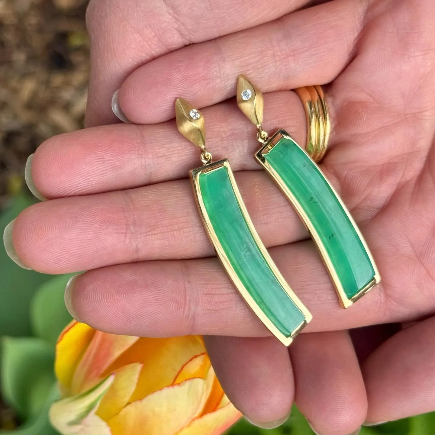 Happy Spring! 💚 

A new design earring we just finished. Glowing green Chrysoprase in 18k yellow gold with a kiss of diamond at the top.