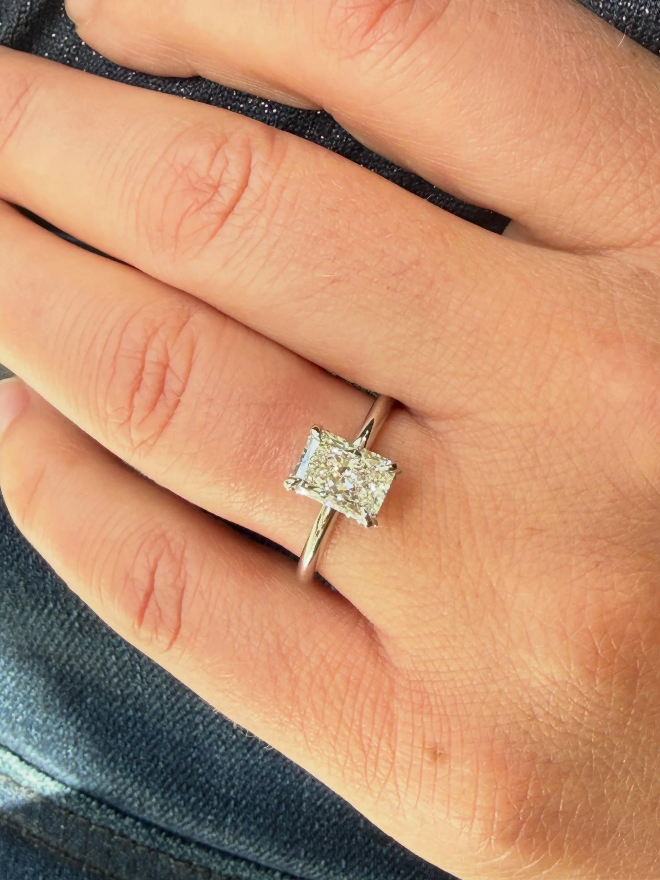 Classic and Elegant - Radiant Cut Diamond set in a Custom Design Hidden Halo Platinum Ring