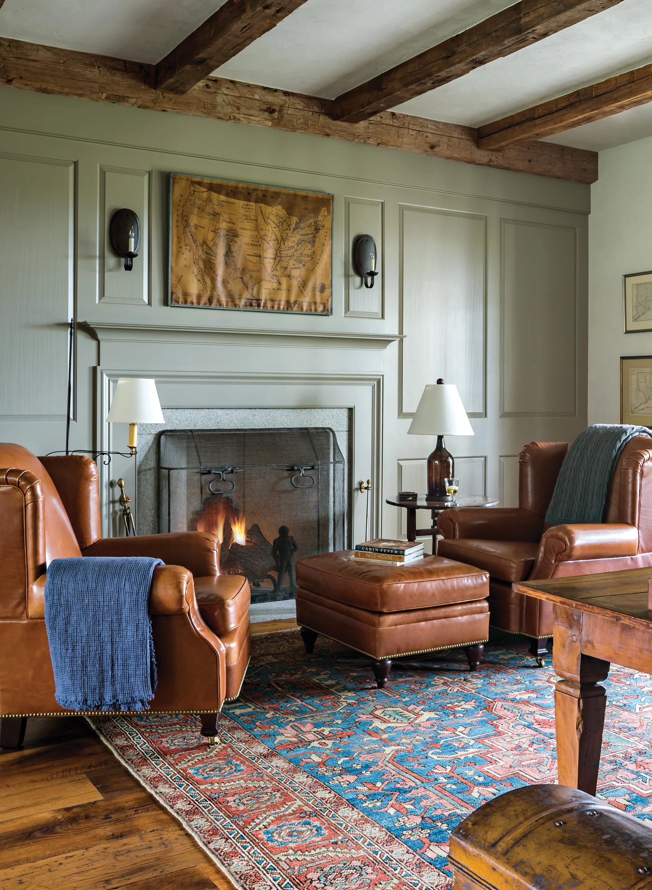 The Study's leather lounge chairs provide a comfortable reading spot next to the fire.