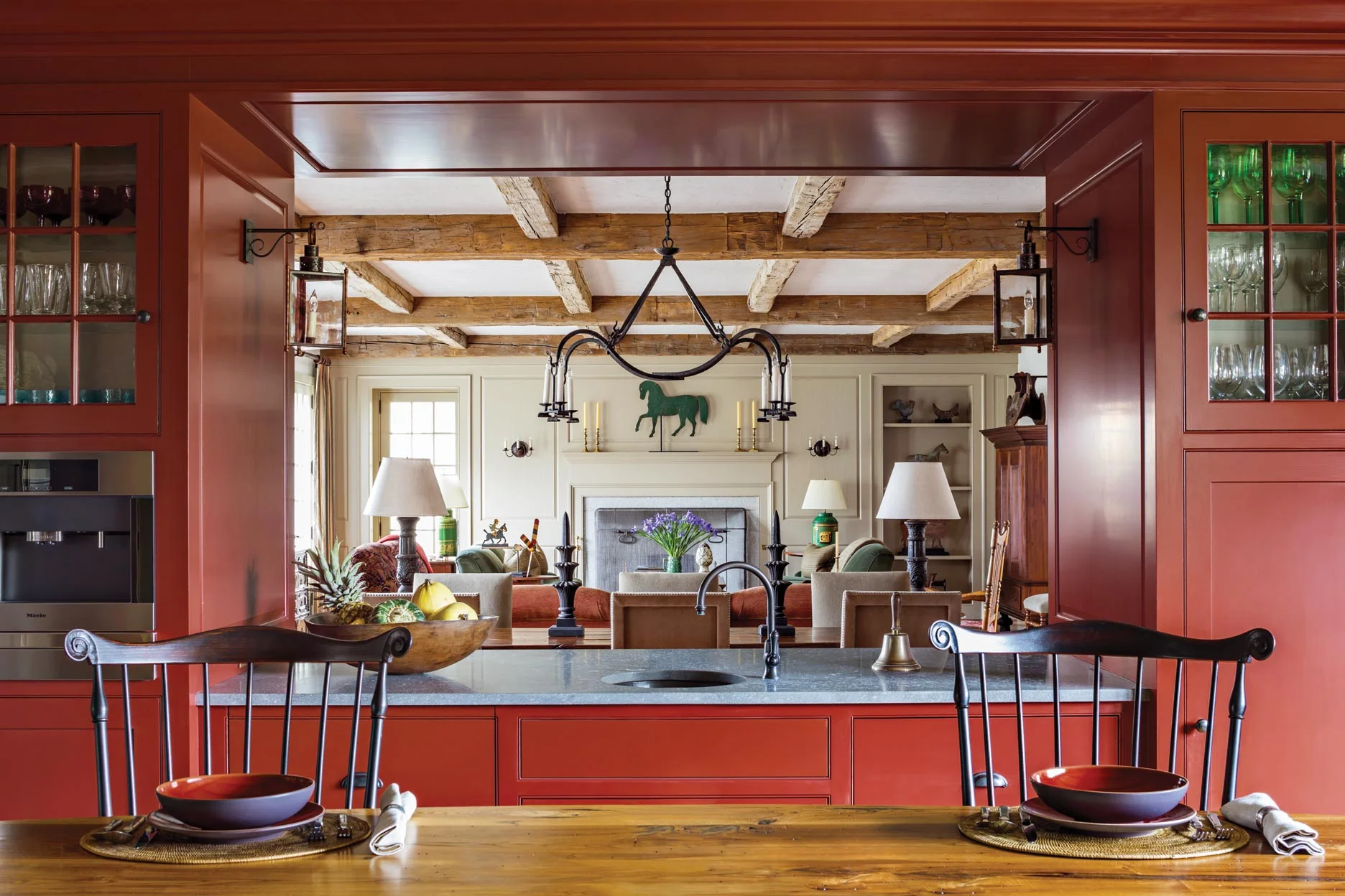 A pass-through counter serves as a beverage center and provides a visual connection from the Kitchen to the Living Room / Dining Room.