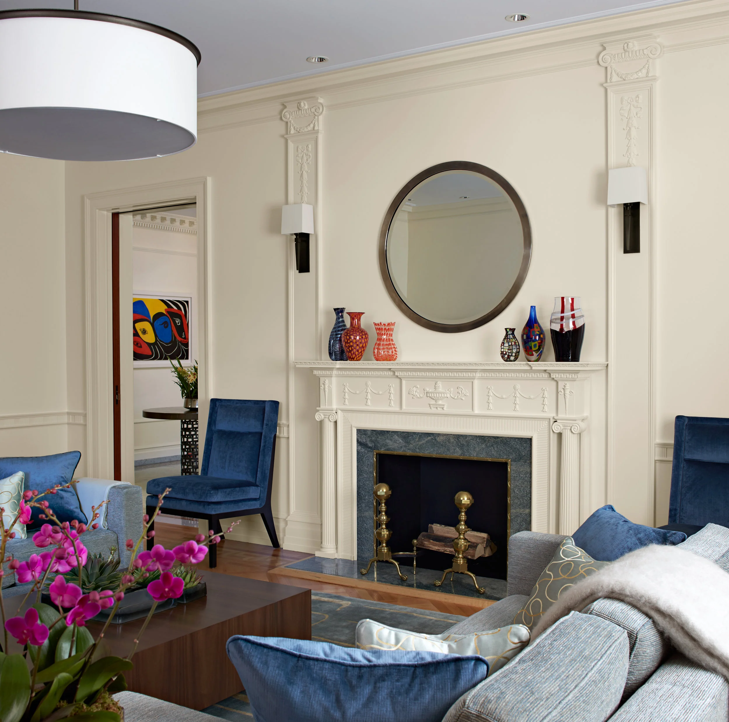 Neutral walls throughout the apartment provide a soft backdrop to the owners' collection of classic modern art and Murano glass.