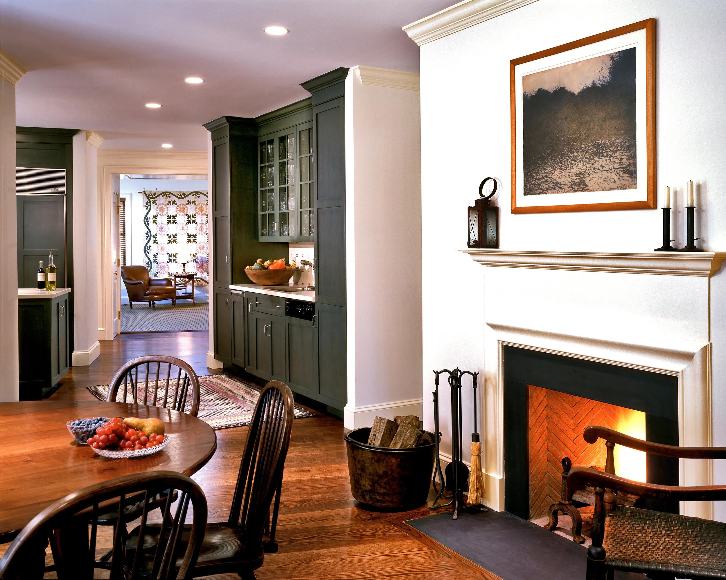 A slate-trimmed fireplace warms the breakfast area.