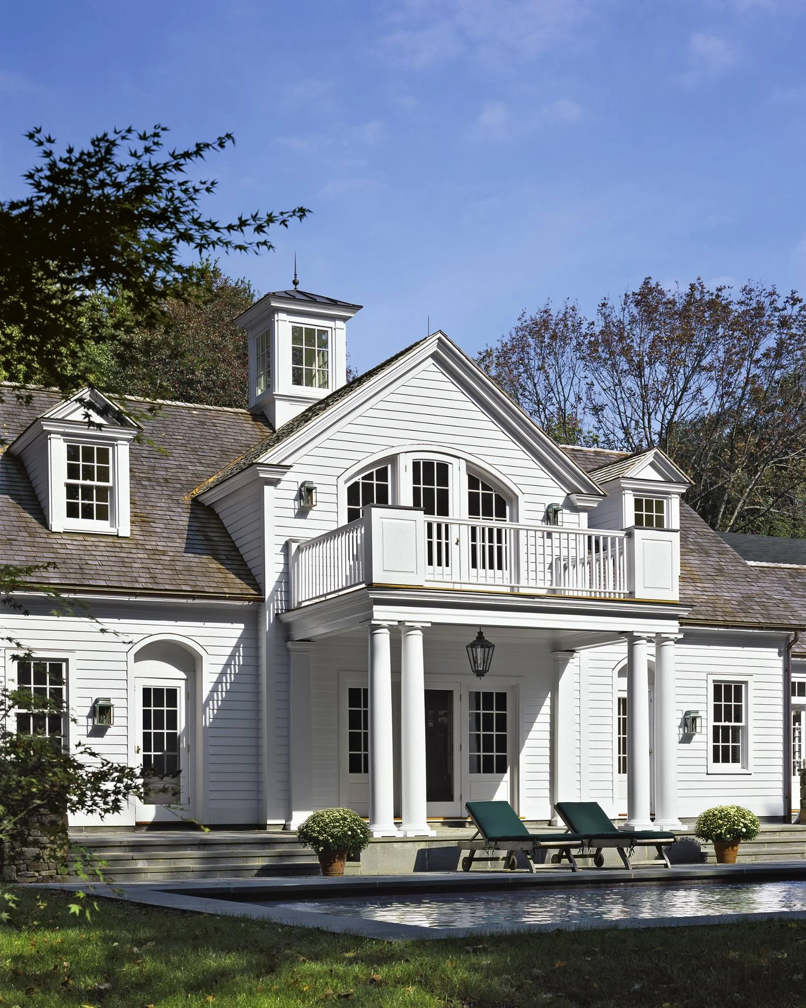 The Portico provides a vantage point for enjoying the pool from both levels.