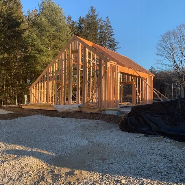  With framing nearly complete, the building takes shape. 