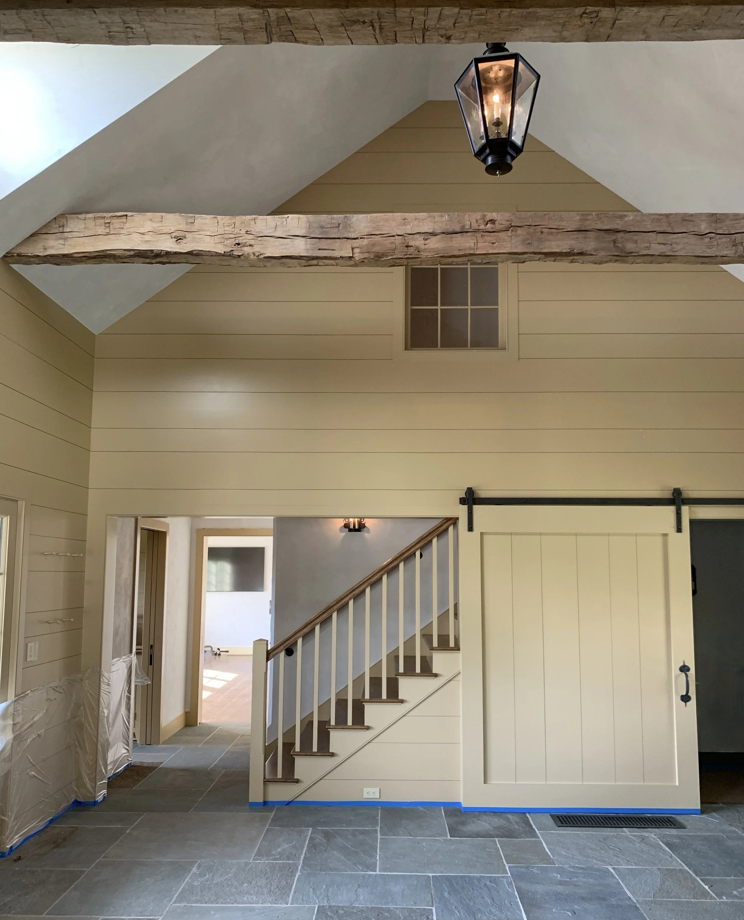  The Mud Room features a natural-cleft bluestone floor. 