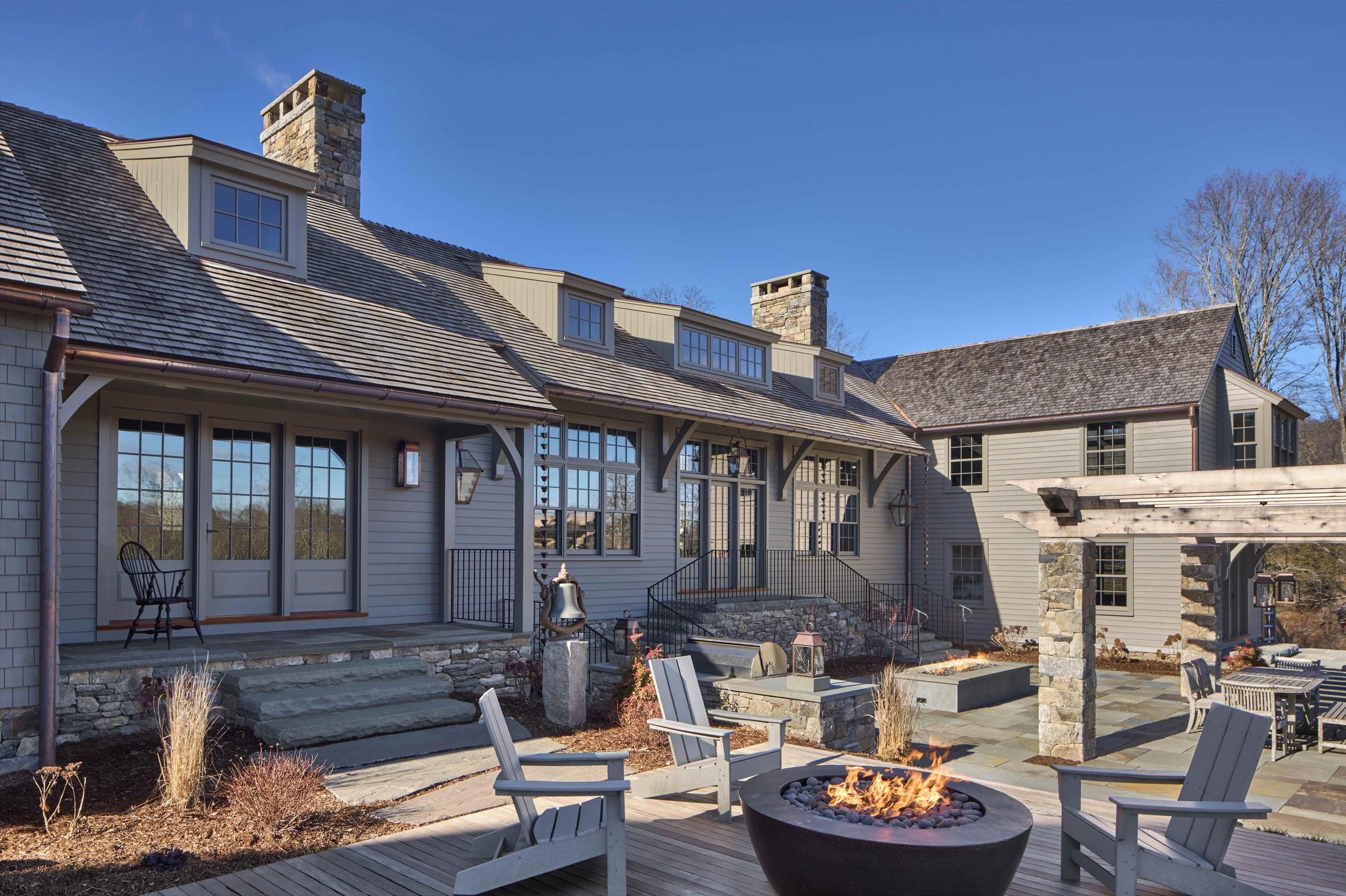  The outdoor entertainment and dining areas have convenient access to the new Mud Room and Great Room. 