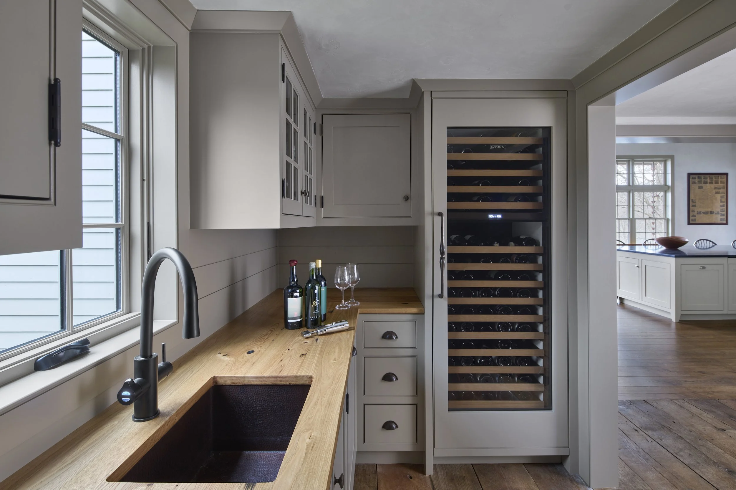  The Butler’s Pantry connects the antique house to the addition and serves both the Great Room and Keeping Room. 