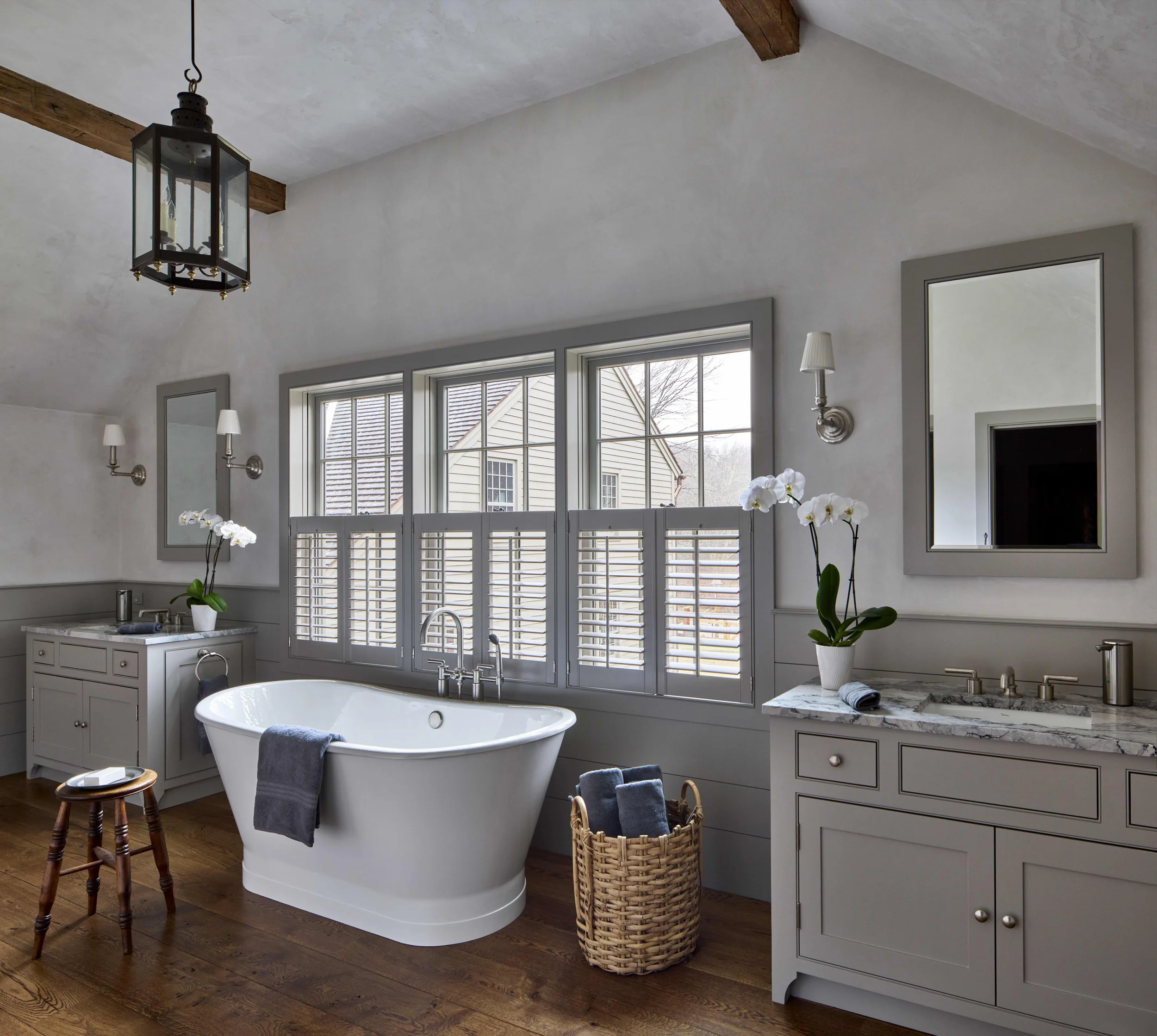  The Primary Bathroom’s soaking tub offers views of the surrounding meadows. 