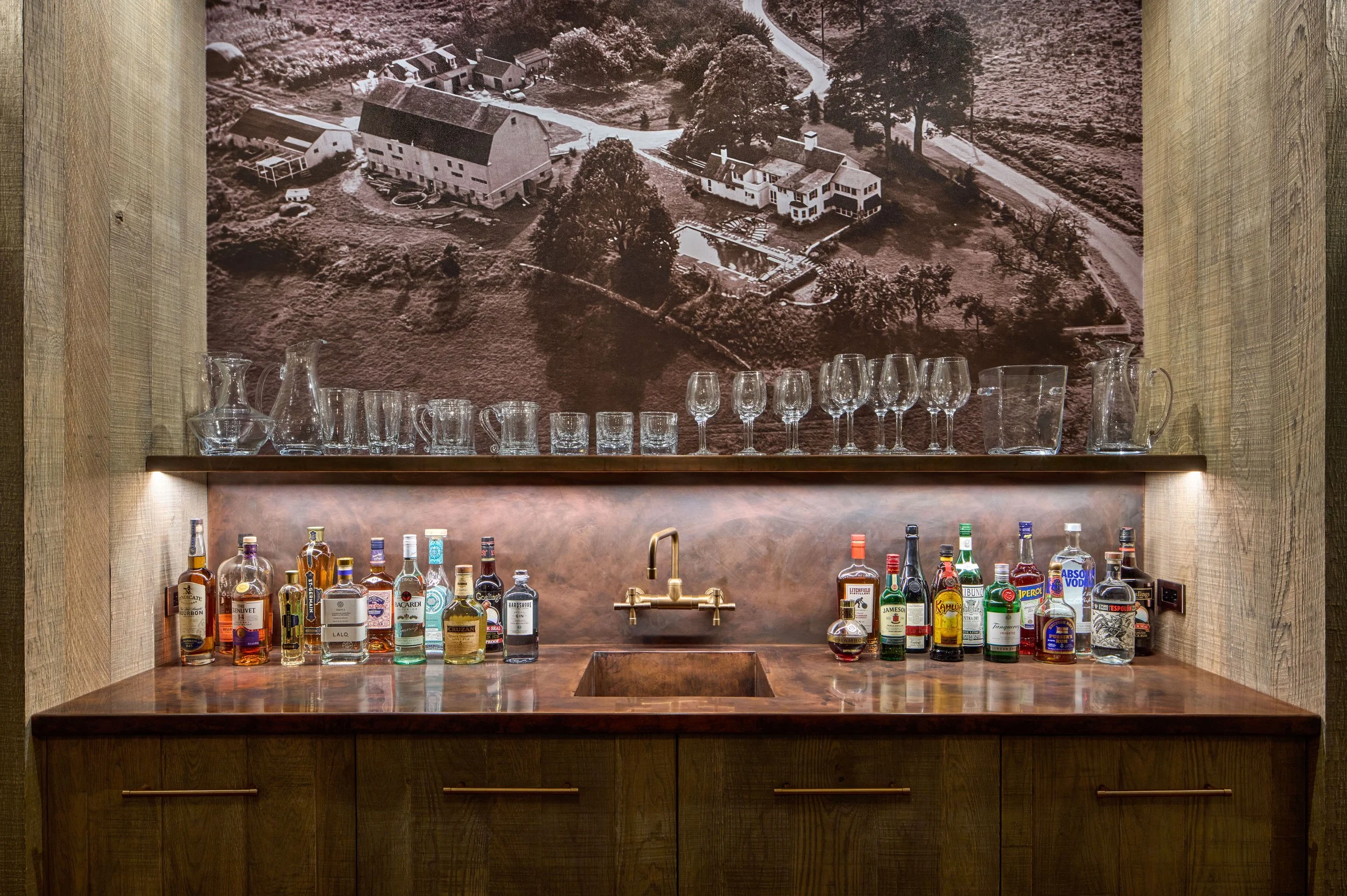  The counter, integral sink, backsplash &amp; shelf are of antiqued copper.  The cabinets are of rough-sawn reclaimed oak. 