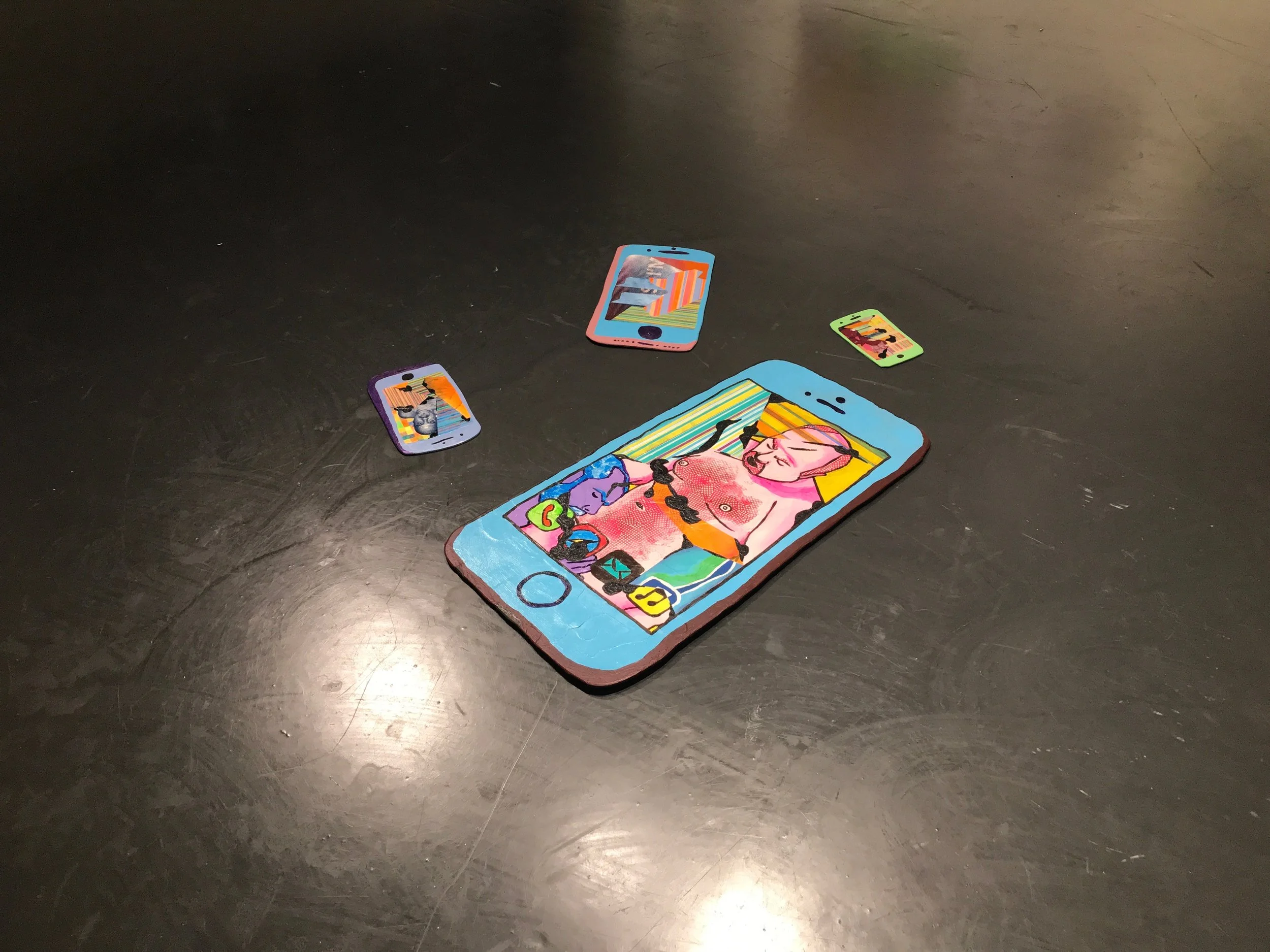 broken iPhones (installation view)