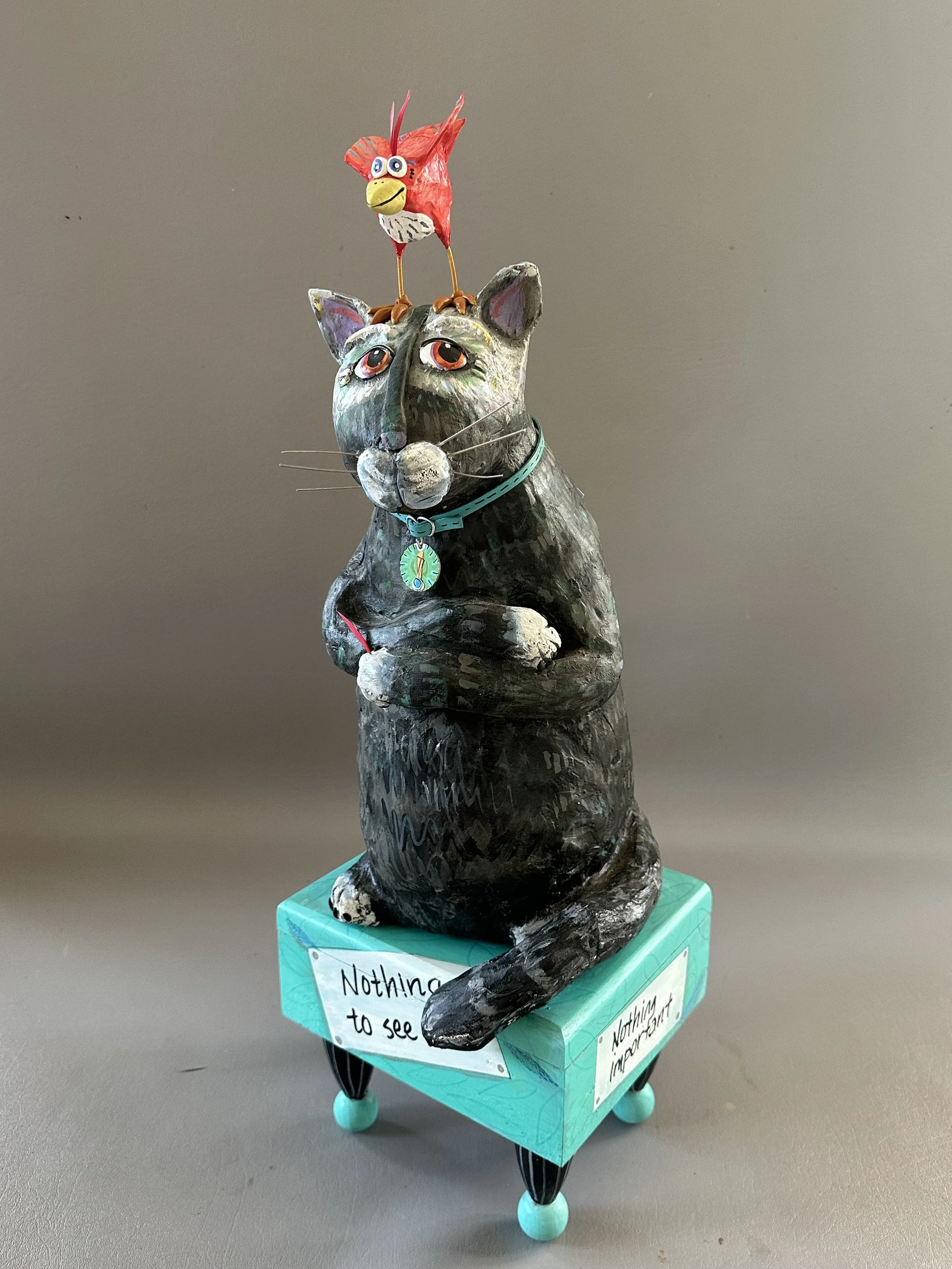 J Curvin Image Cat & Bird.jpeg