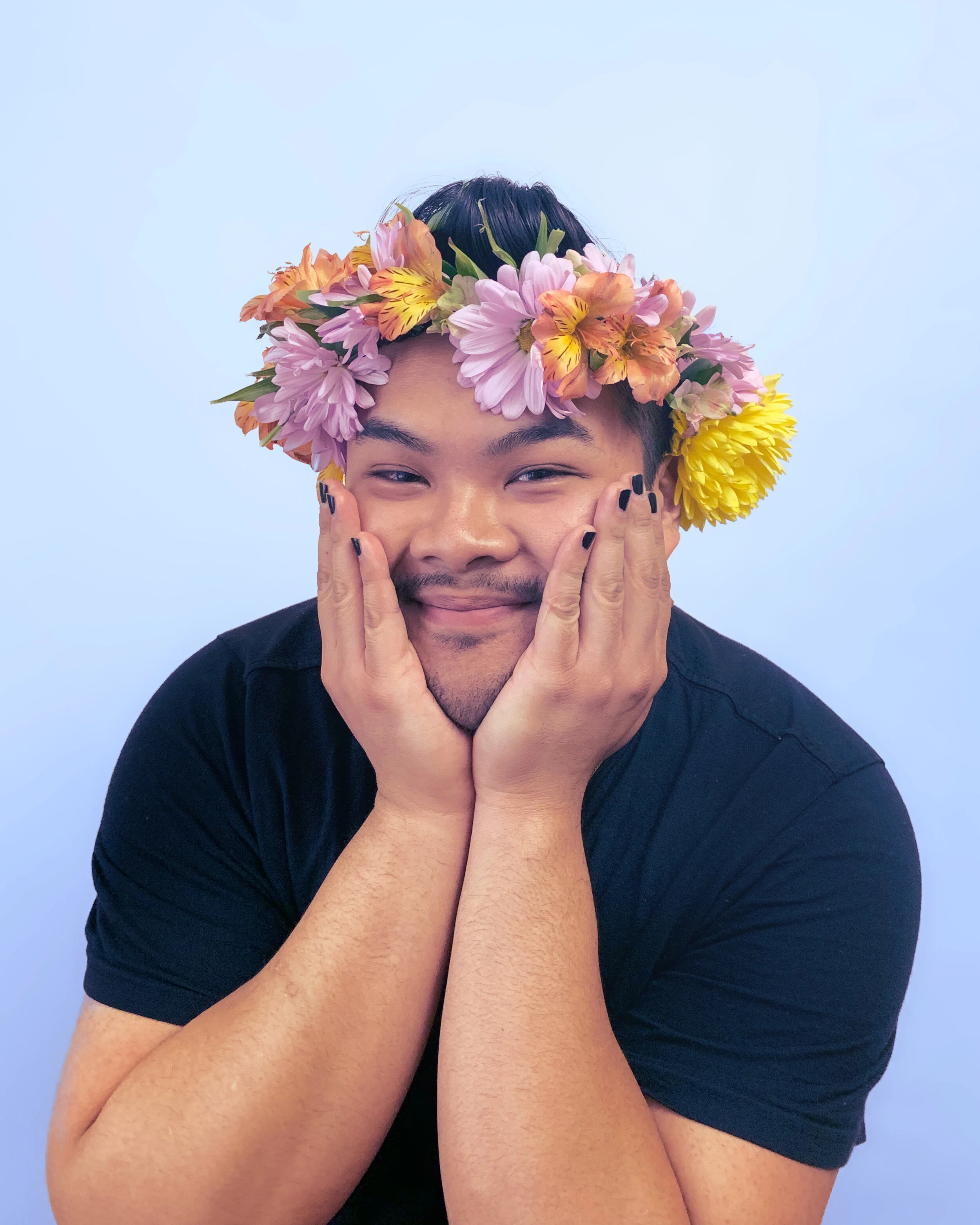 flower crown hands on face.jpg