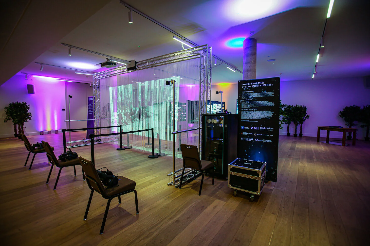  The notorious image can be seen projected onto a theatrical drape that VR participants push through 