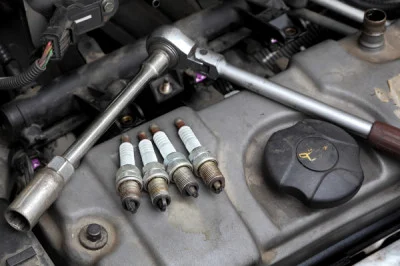 Engine Tune-up/ Fuel Injection Service - Inside your engine you have "combustion chambers" that create the power necessary to make your vehicle run. Air and fuel is mixed together, compressed and then combusted to create this power. Overtime this will cause carbon build up on your park plugs, throttle body, intake manifold, exhaust manifold and other components. Carbon build up is the by product produced from the burnt mixture. This will restrict your engine from being able to breathe and your spark plugs from being able to ignite the air/fuel mixture normally Which in the long run will reduce engine life, cause lack of power and decrease fuel economy. We offer tune-up packages and an injection system clean that will ensure your vehicle has a longer life. 