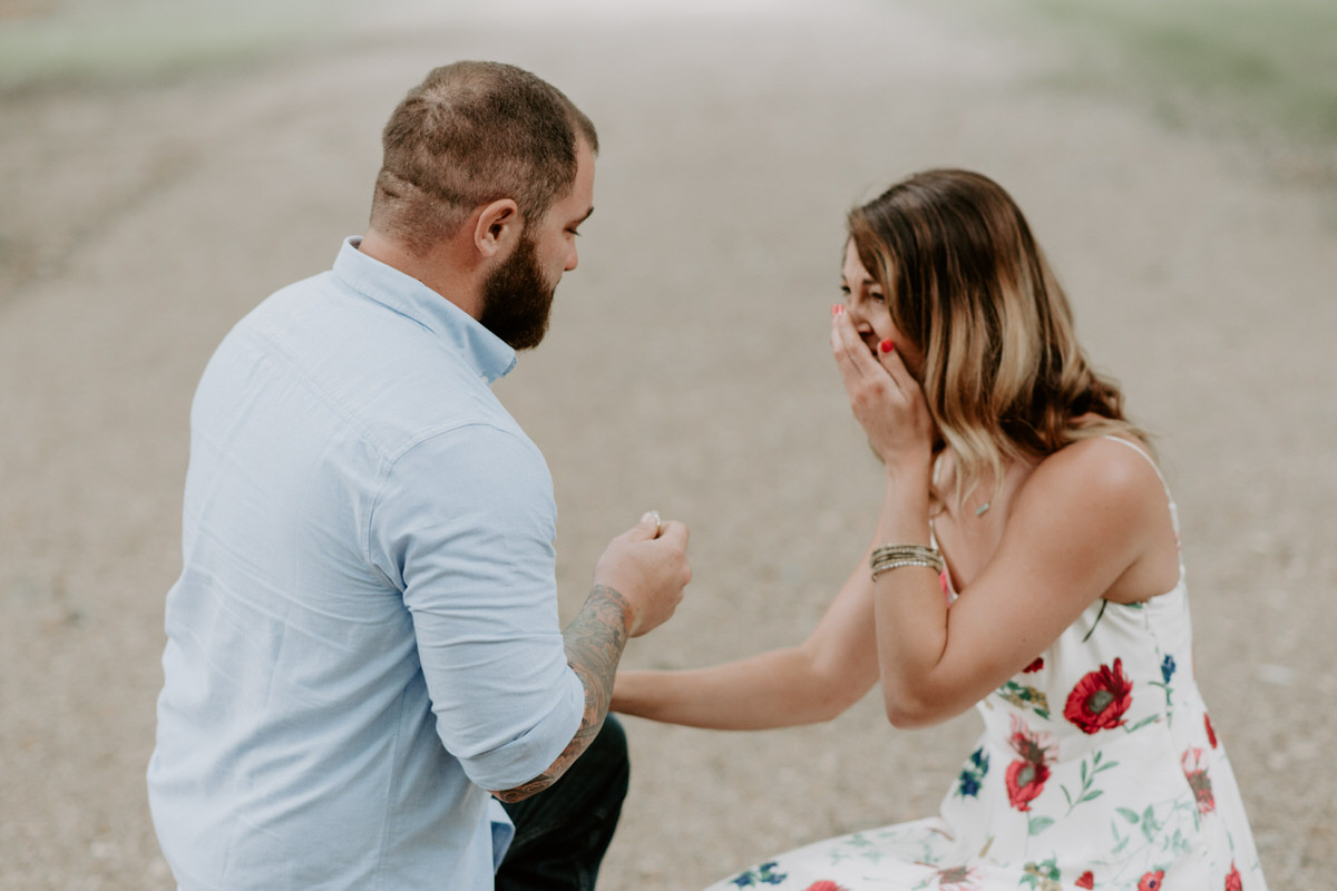 Sweet family and surprise proposal session in st. francisville, louisiana at rosedown plantation with gorgeous oak trees photographed by magnolia and grace photography