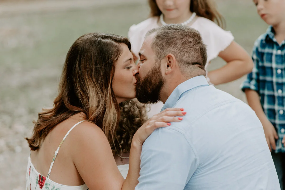 Sweet family and surprise proposal session in st. francisville, louisiana at rosedown plantation with gorgeous oak trees photographed by magnolia and grace photography