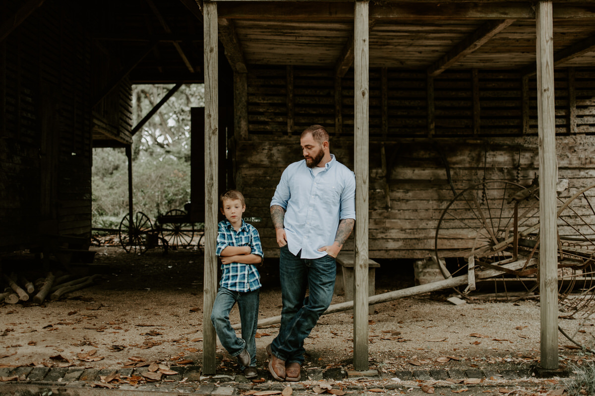 Sweet family and surprise proposal session in st. francisville, louisiana at rosedown plantation with gorgeous oak trees photographed by magnolia and grace photography