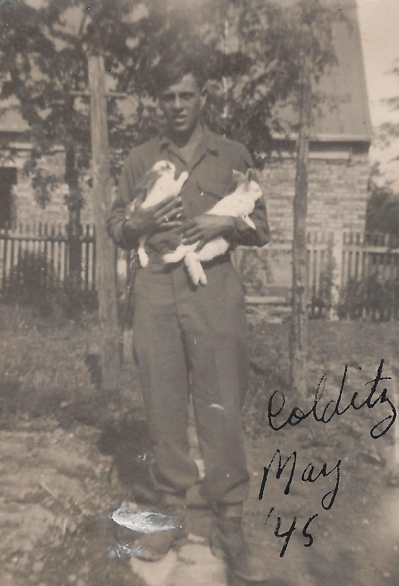 Dad Colditz Germanywith Bunny Rabbits May 1945.jpg