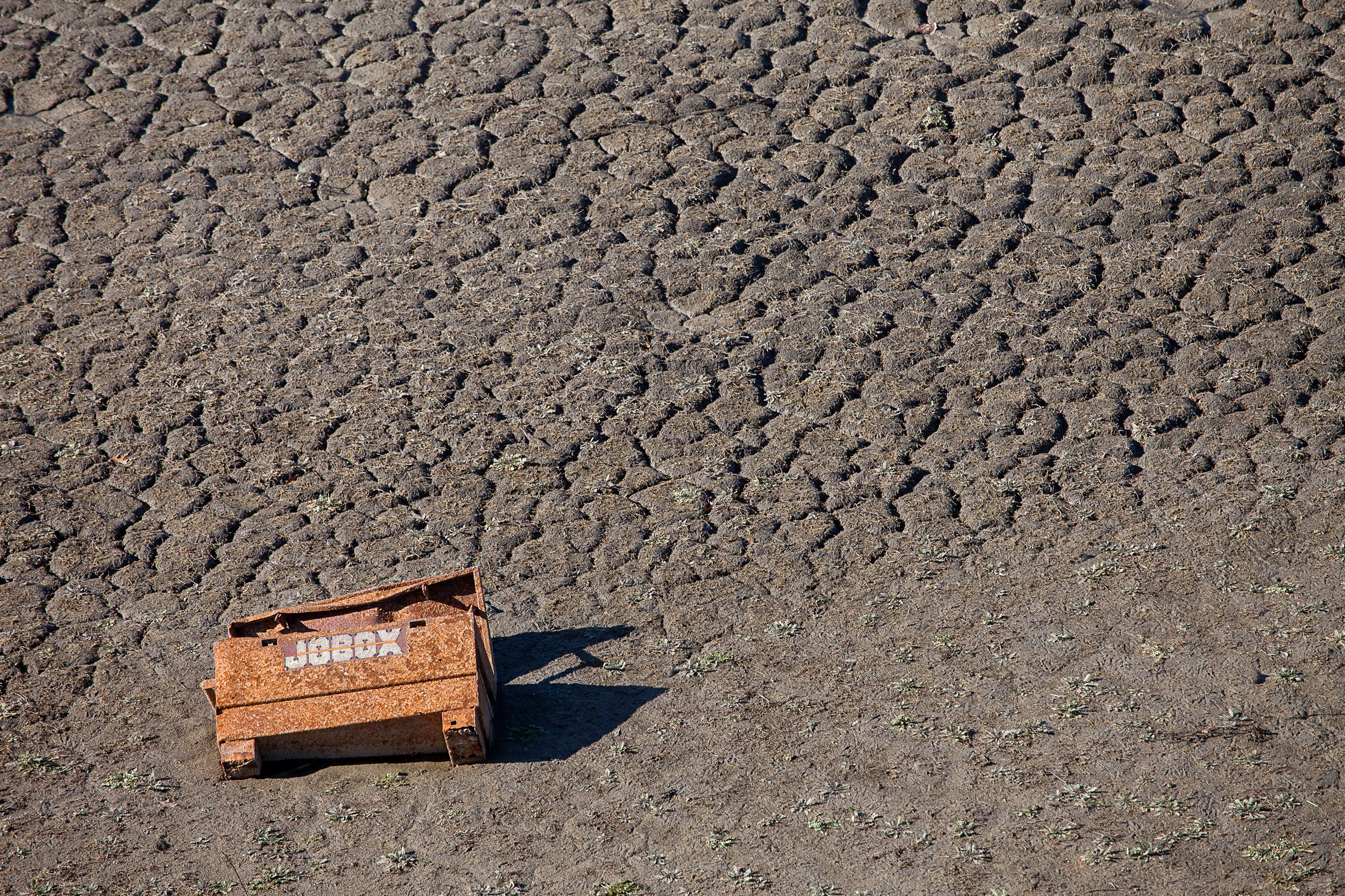 Rusty-Job-Box-In-Cracked-Mud-From-Lucas-Bridge_45860.jpg