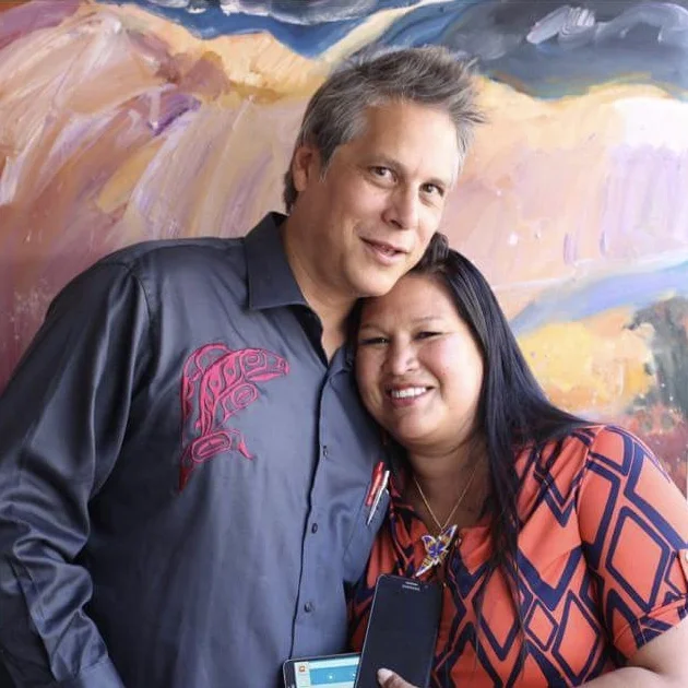 Mateo Romero and wife Melissa pose affectionately.