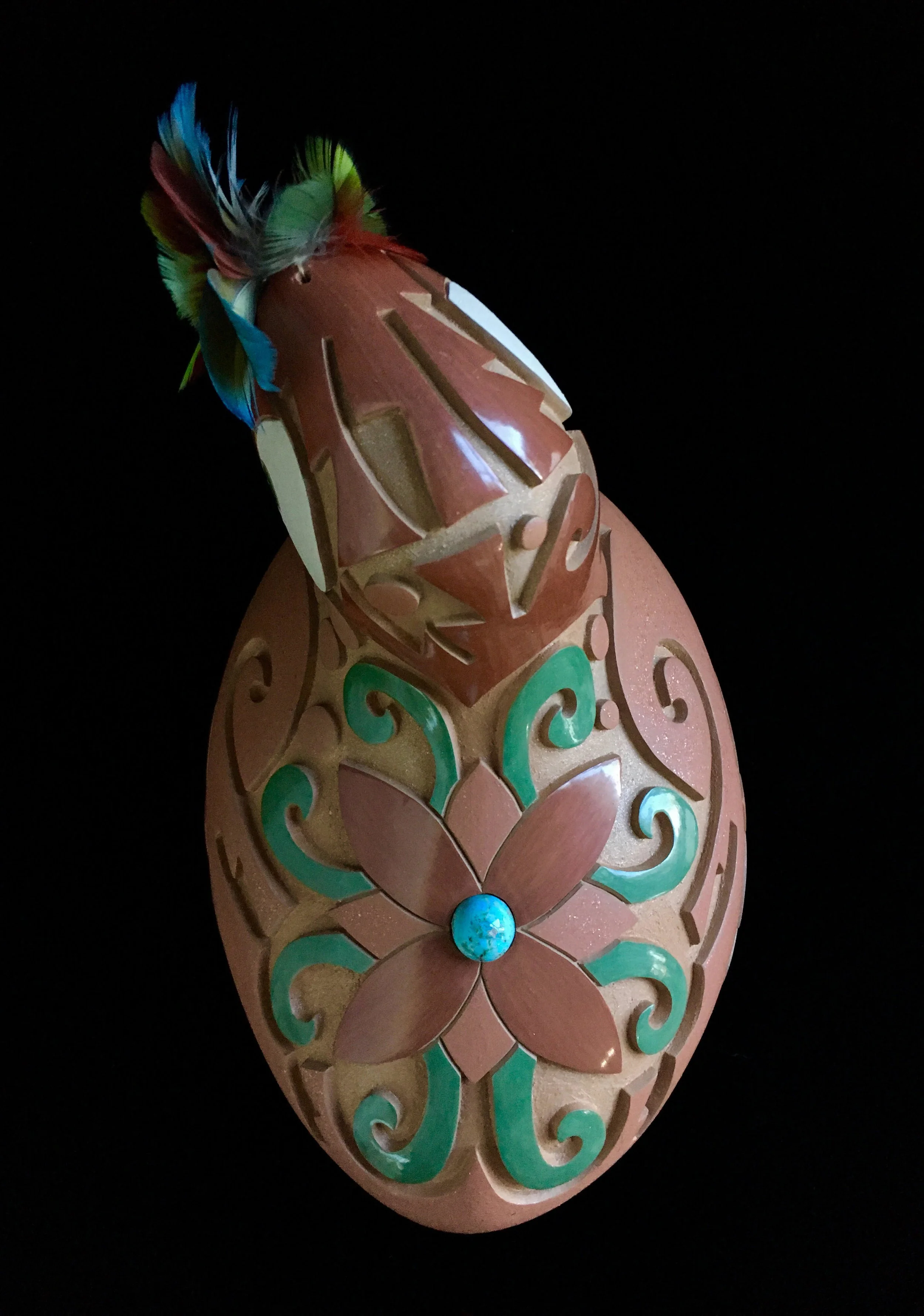 Autumn's clay Anasazi parrot .
