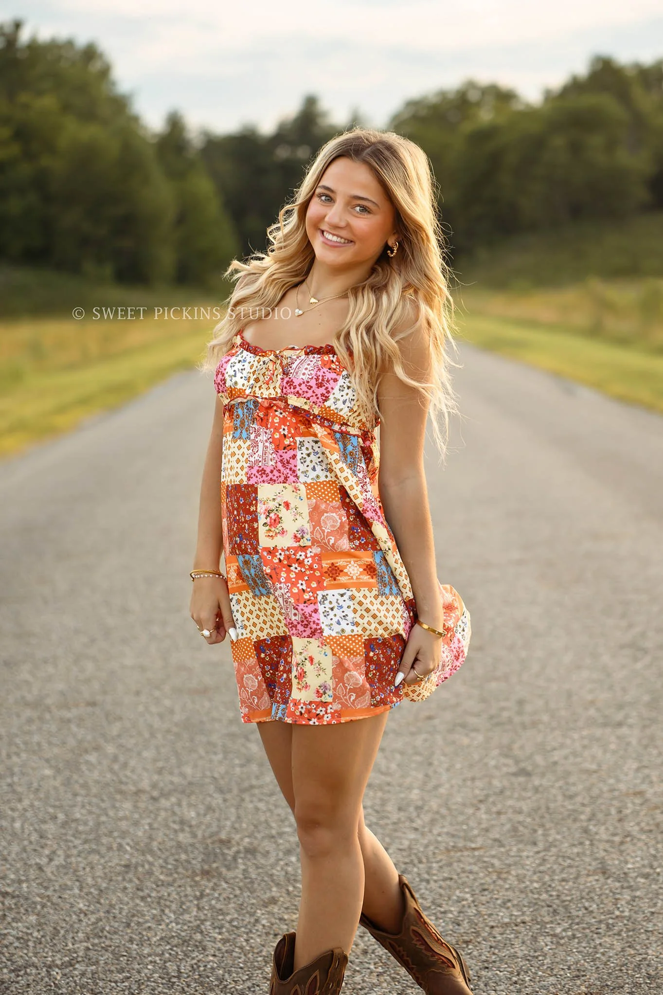 Addison’s Peru, Indiana Senior Photography in Wildflower Field at Sunset wearing patchwork babydoll dress with western cowboy boots in country location by Sweet Pickins Studio senior photographer Amanda Wilson  ©