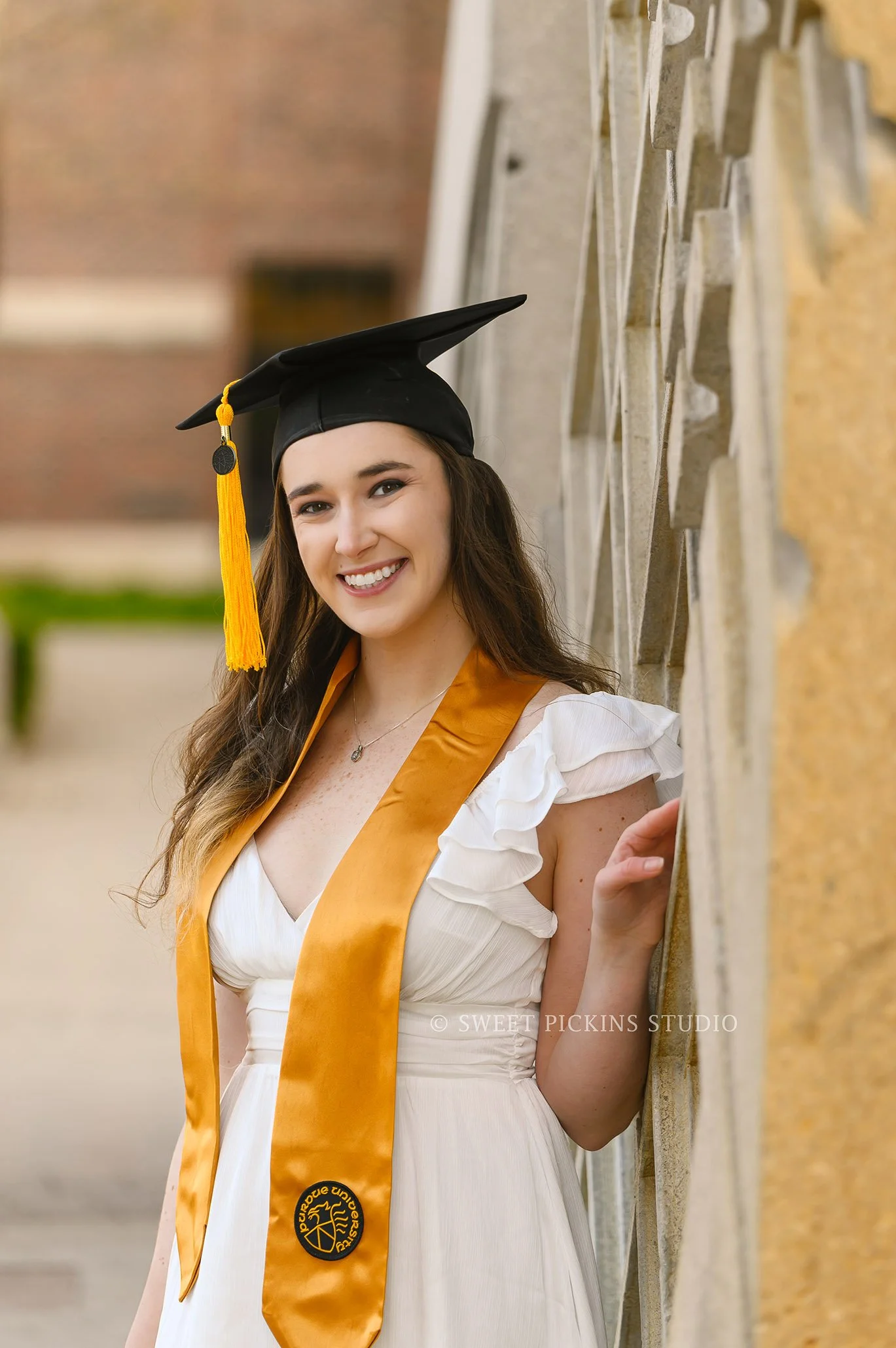 Emily | Purdue University Graduation Portraits in West Lafayette, Indiana at Engineering Fountain in Spring by Sweet Pickins Studio senior photographer Amanda Wilson ©