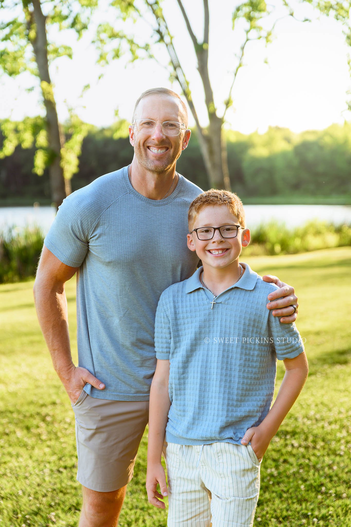 Roann, Indiana Family Portrait Photography of father and son wearing blue and beige outfits at Luken’s Lake outdoor nature location in summer by Sweet Pickins Studio family photographer Amanda Wilson ©