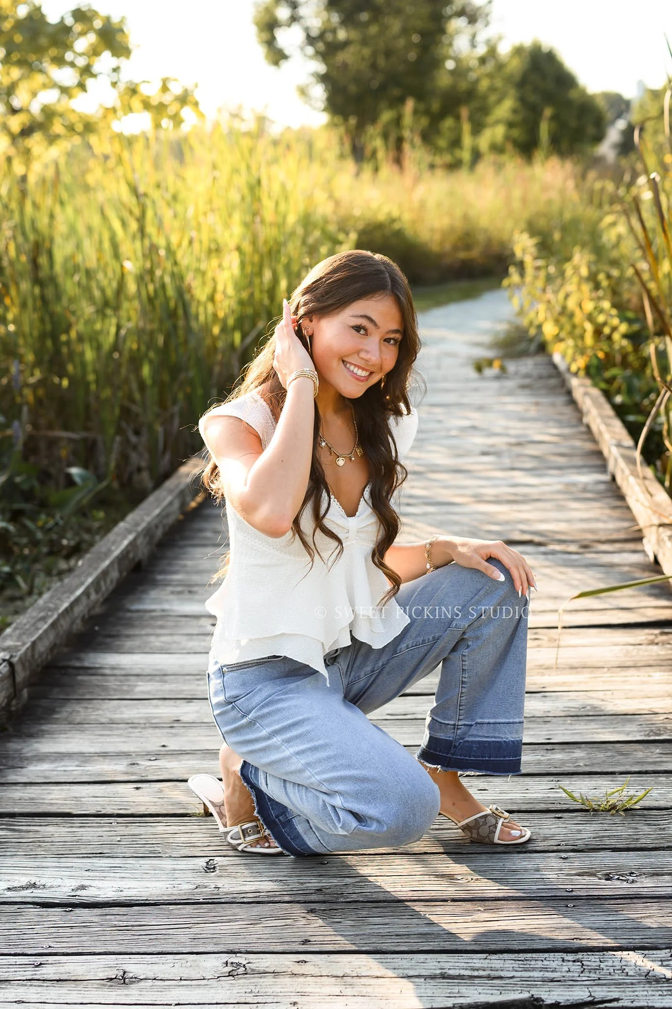 Rachel | Carmel, Indiana Senior Portrait Posing for Class of 2027 senior girl wearing denim jeans and white shirt by Sweet Pickins Studio senior photographer Amanda Wilson ©