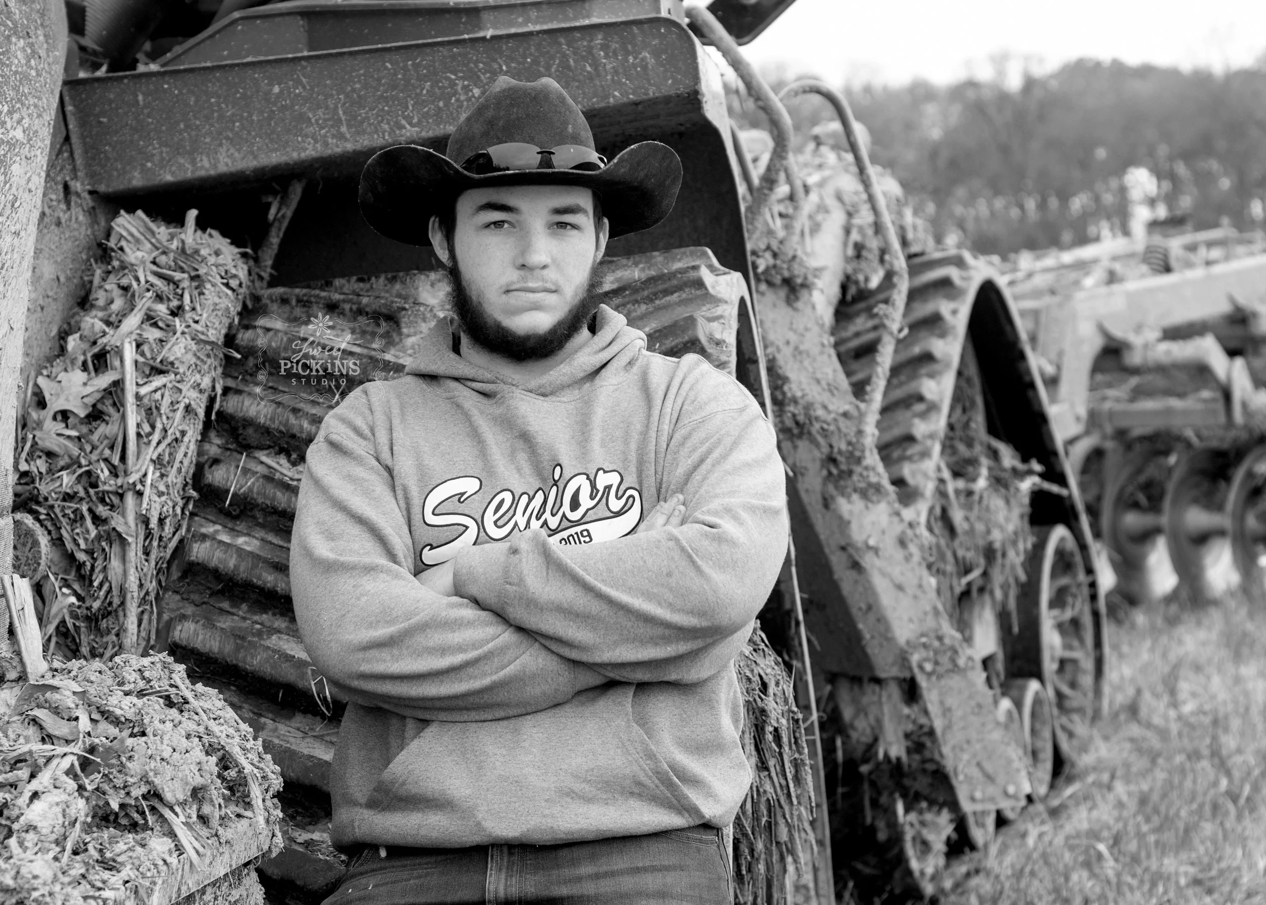 Black and White Senior Portrait with Case IHQuad Track Tractor | Huntington North, Indiana