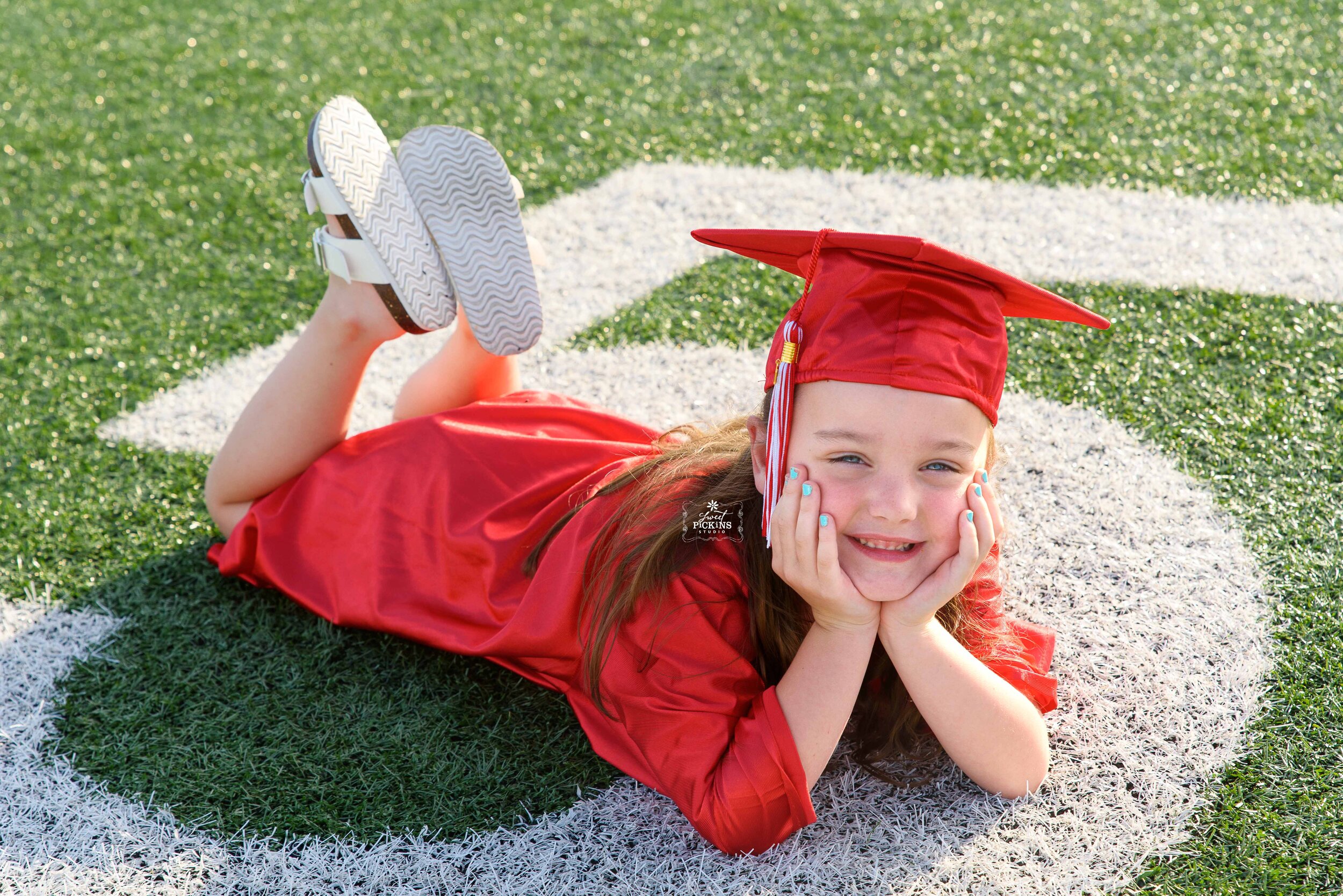 Portrait Of A Girl Wearing A Cap And Gown And Holding A Degree High-Res  Stock Photo - Getty Images