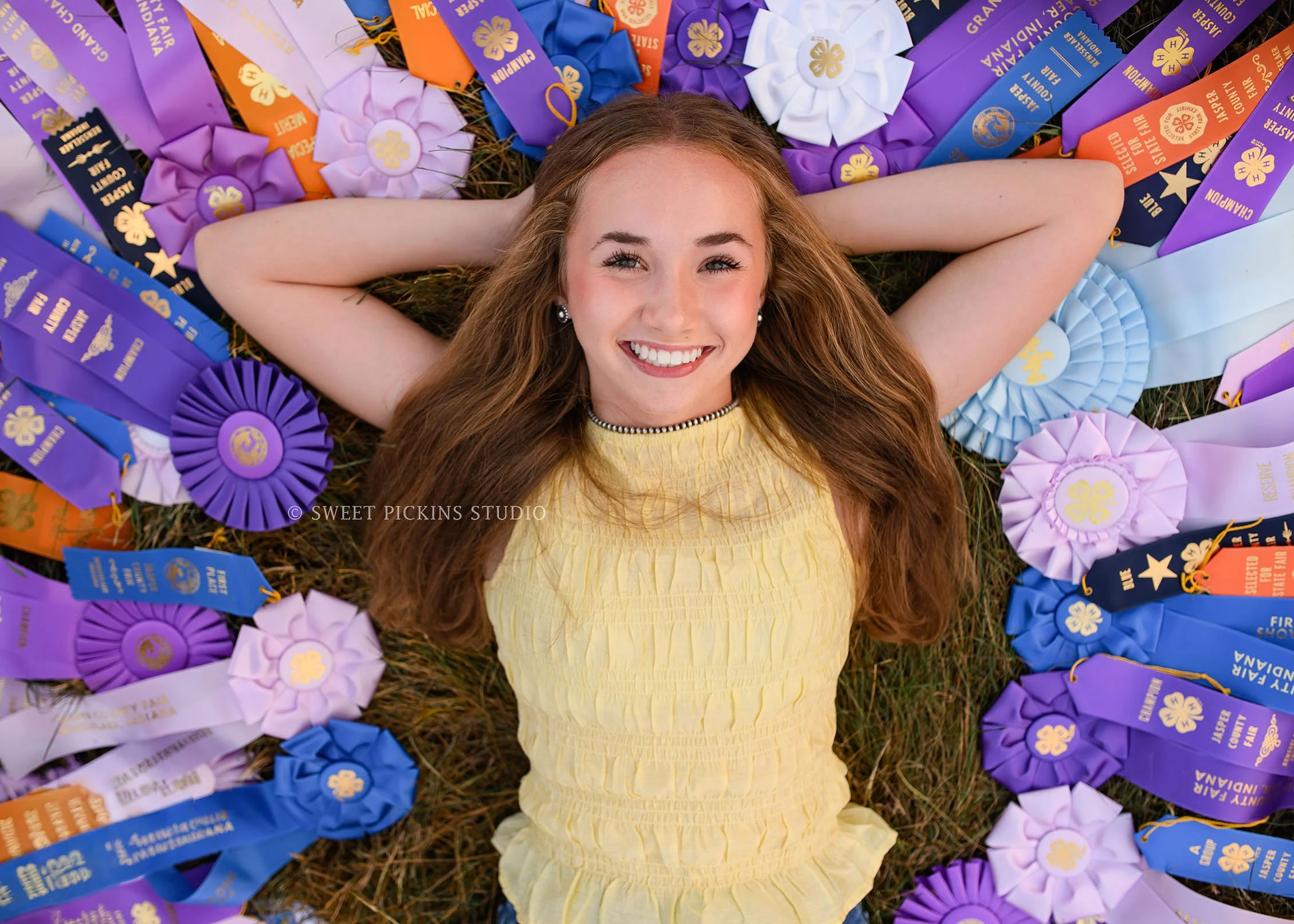 Natalie's 4-H Senior Photography with livestock show ribbons on farm by Sweet Pickins Studio photographer Amanda Wilson ©