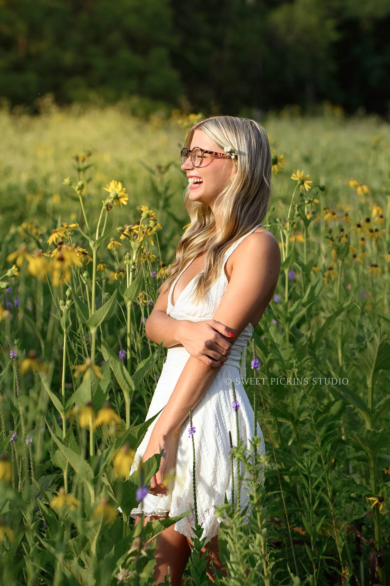 Kyree’s Wildflower Field Senior Picture Photography in Peru, Indiana for Logansport High School Class of 2027 senior girl wearing white long dress in summer by Sweet Pickins Studio senior photographer Amanda Wilson ©
