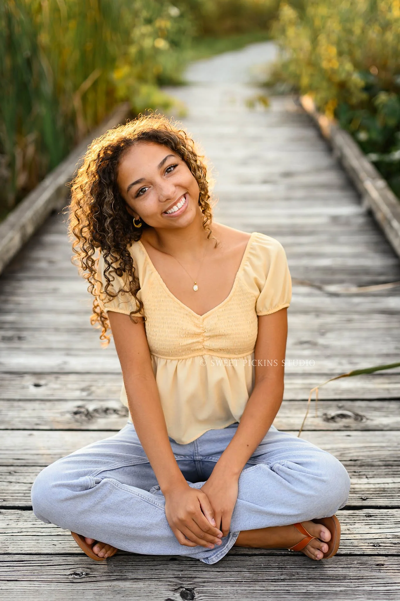 Madeline | Senior Girl Photography on Wood Boardwalk for Class of 2027 by Peru Indiana Senior  photographer Amanda Wilson of Sweet Pickins Studio ©