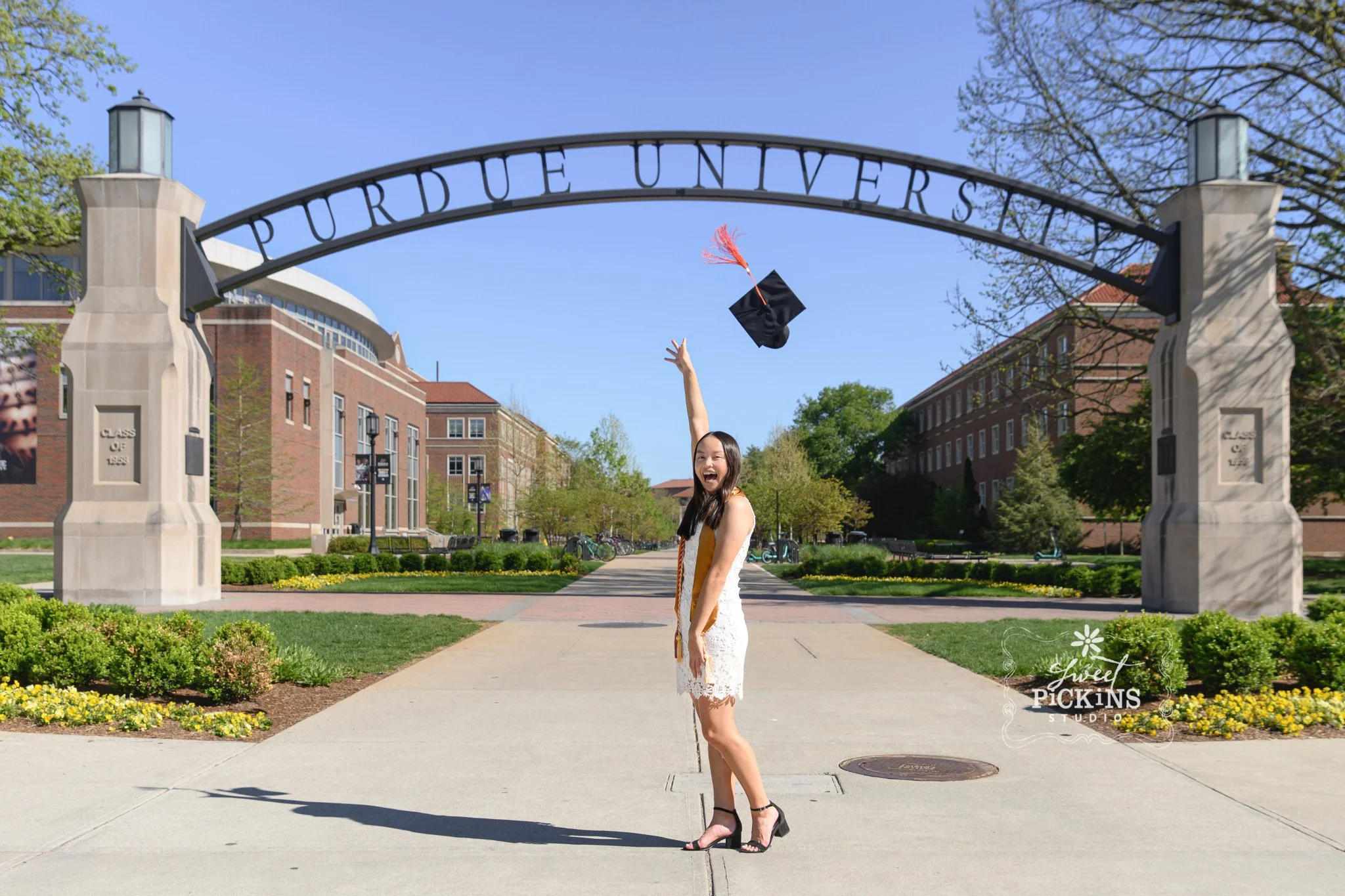 Purdue Graduation Cap and Gown Photography in West Lafayette, Indiana for Civil Engineering Graduate in Spring by Sweet Pickins Studio senior photographer Amanda Wilson ©