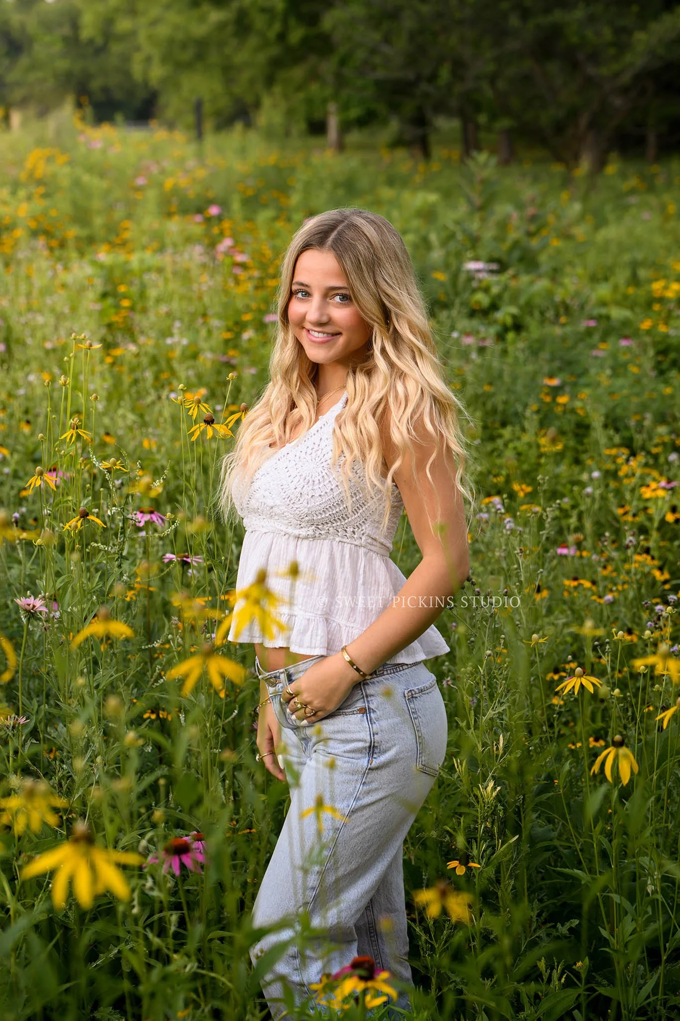 Addison’s Peru, Indiana Wildflower Senior Photography in Summer golden hour wearing white eyelet tank top and denim jeans  by Sweet Pickins Studio senior photographer Amanda Wilson  ©