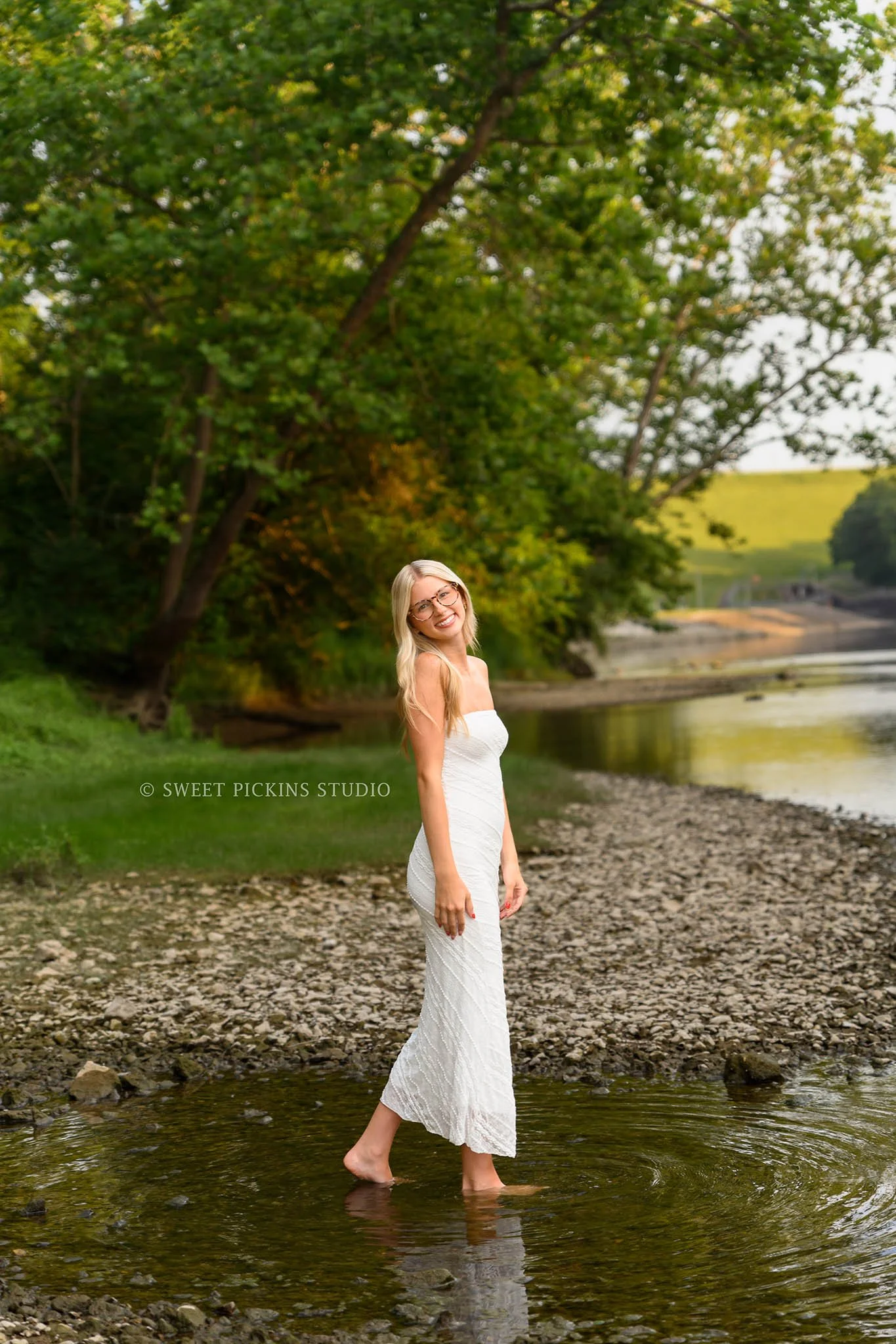 Kyree’s River Senior Picture Photography in Peru, Indiana for Logansport High School Class of 2027 senior girl wearing white long dress in summer by Sweet Pickins Studio senior photographer Amanda Wilson ©