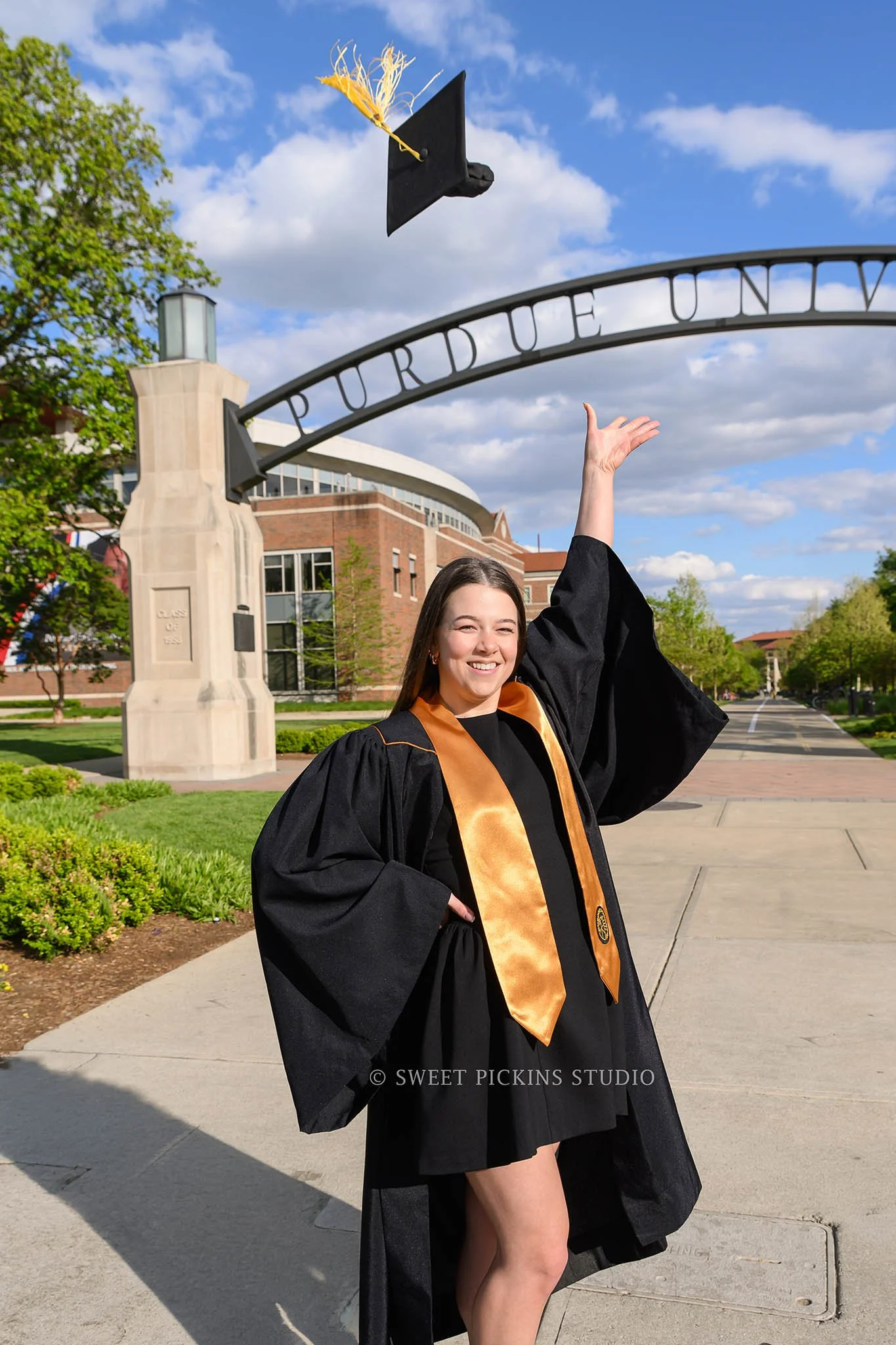 Ashelyn’s Purdue Boilermaker Graduation Portrait Photography for sports nutrition graduate wearing cap and gown in West Lafayette, Indiana by Sweet Pickins Studio senior photographer Amanda Wilson © 2026